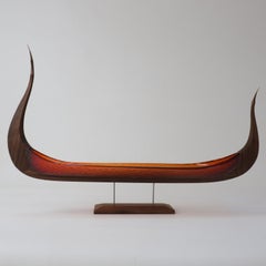 The East Wind, a red glass & oak viking ship by Backhaus & Brown and Egeværk