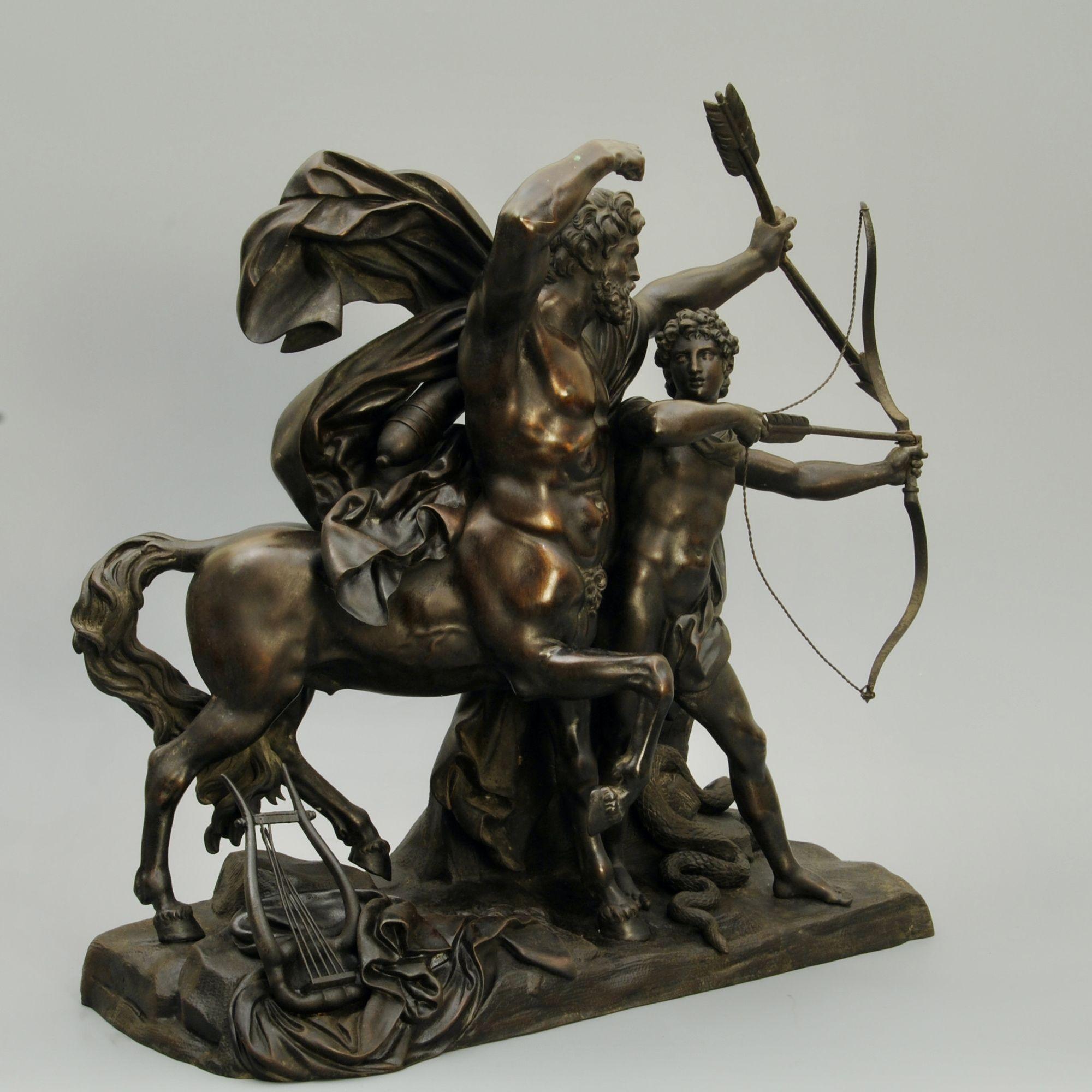 A fine grand tour 19th century bronze group of The education of Achilles.Chiron the centaur is teaching Achilles in the skill of using a bow.
Well patinated and a good quality casting, after the original by Francois Rude.