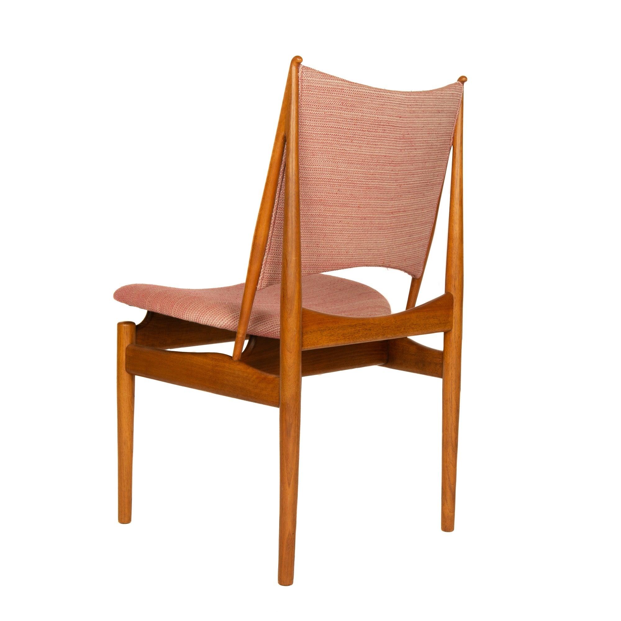 An 'Egyptian' chair in walnut upholstered in a pink & white tweed.