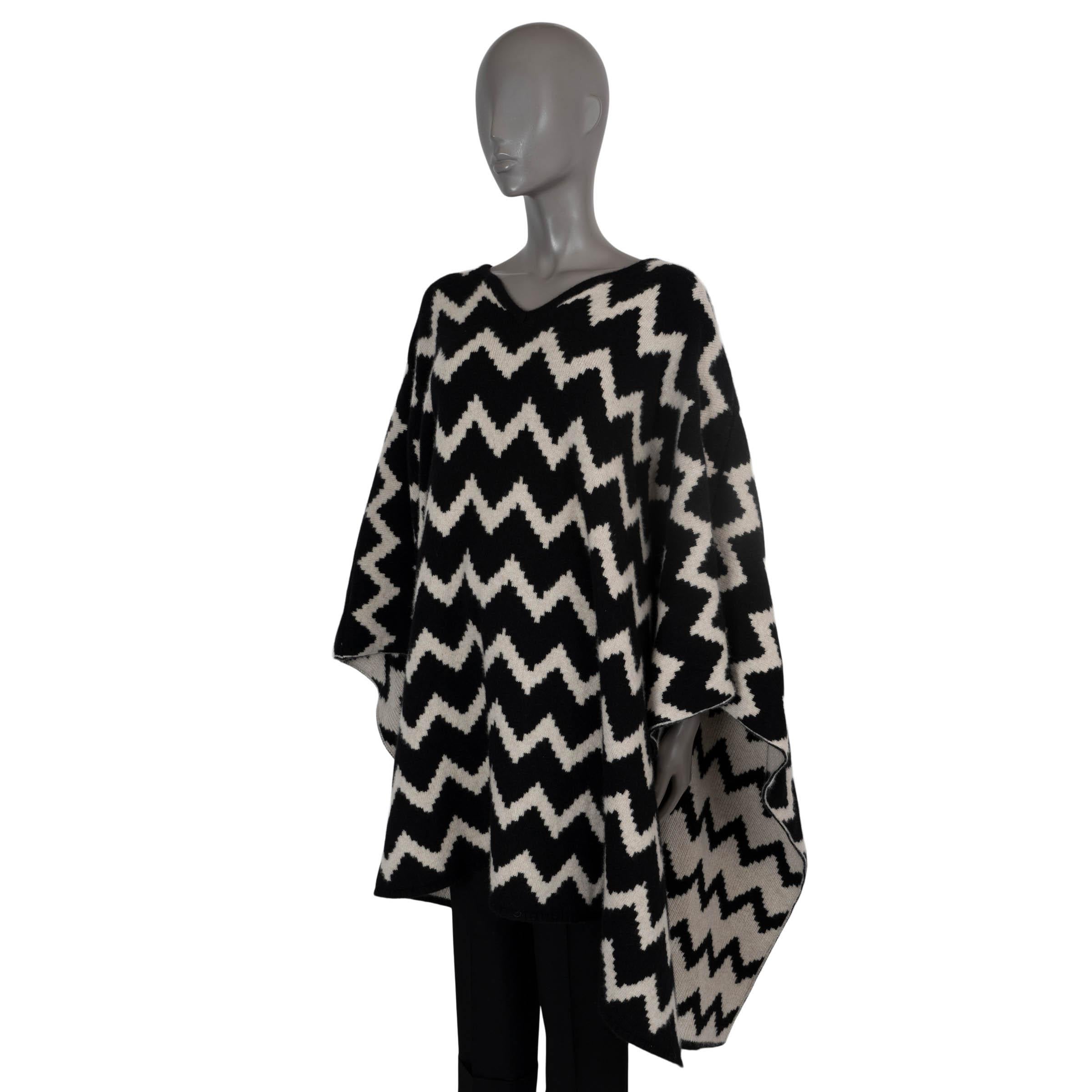 100% authentic The Elder Statesman v-neck poncho in black and ivory cashmere (100%). Unlined. Can be worn reversible. Has been worn and is in excellent condition. 

Measurements
Tag Size	M/L
Size	one size
Length	116cm (45.2in)

All our listings