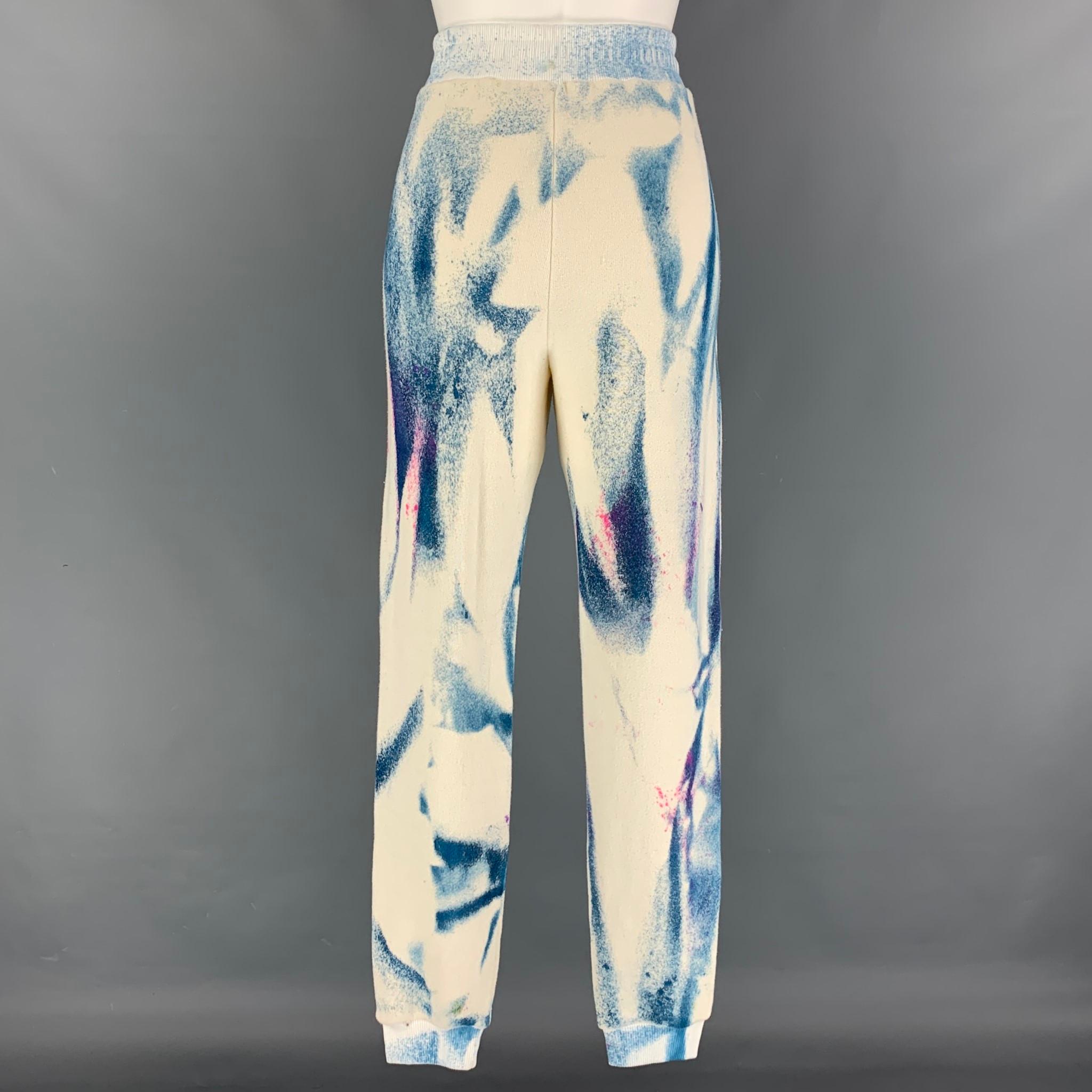 THE ELDER STATESMAN sweatpants comes in a multi-color spinner tie dye acid wash cotton / cashmere featuring a jogger style, slit pockets, and a elastic waistband. Made in USA. Matching pullover sold separately. 

Very Good Pre-Owned