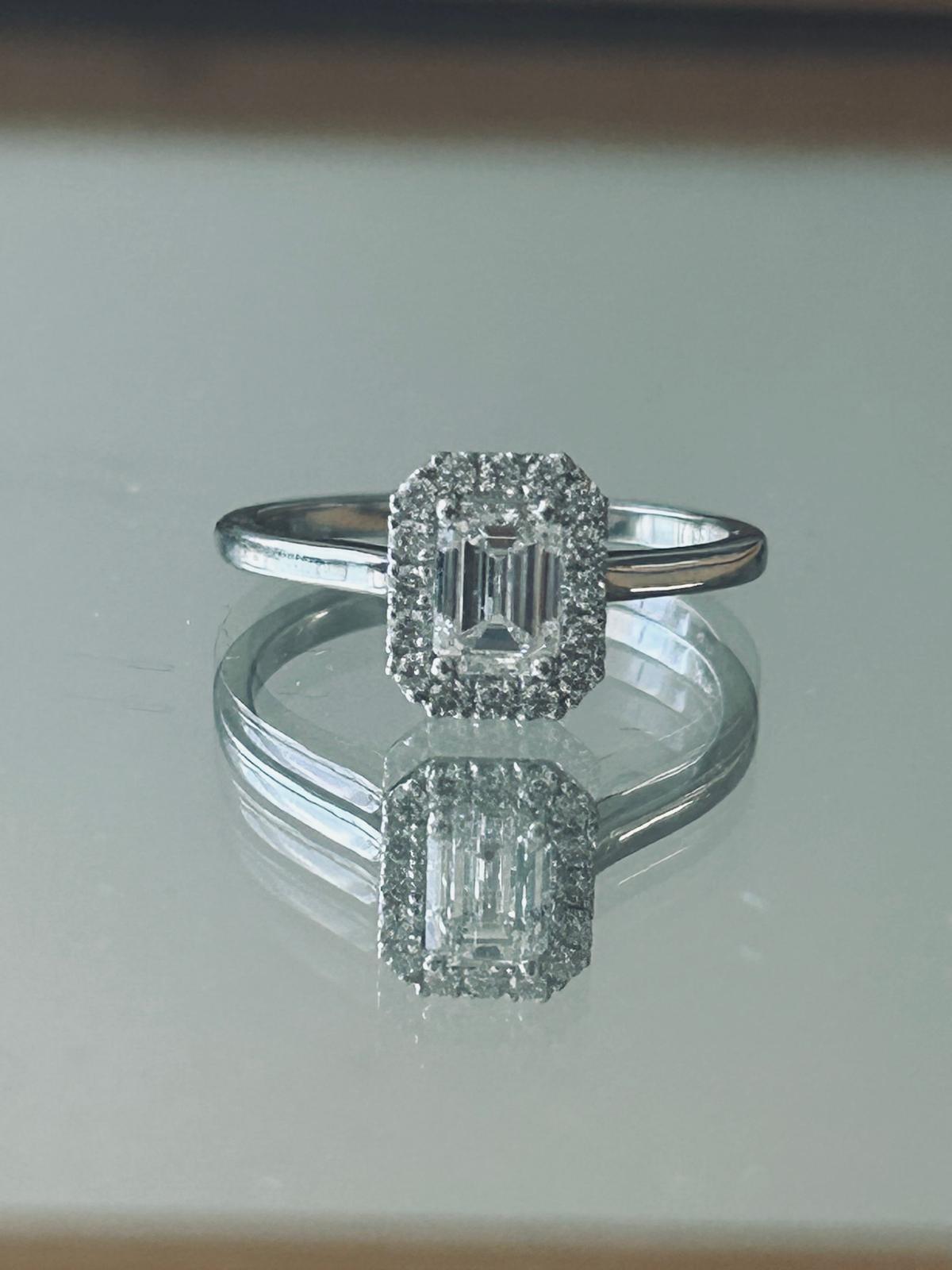 Emerald Cut The Elegant Halo Emerld cut diamond ring For Sale