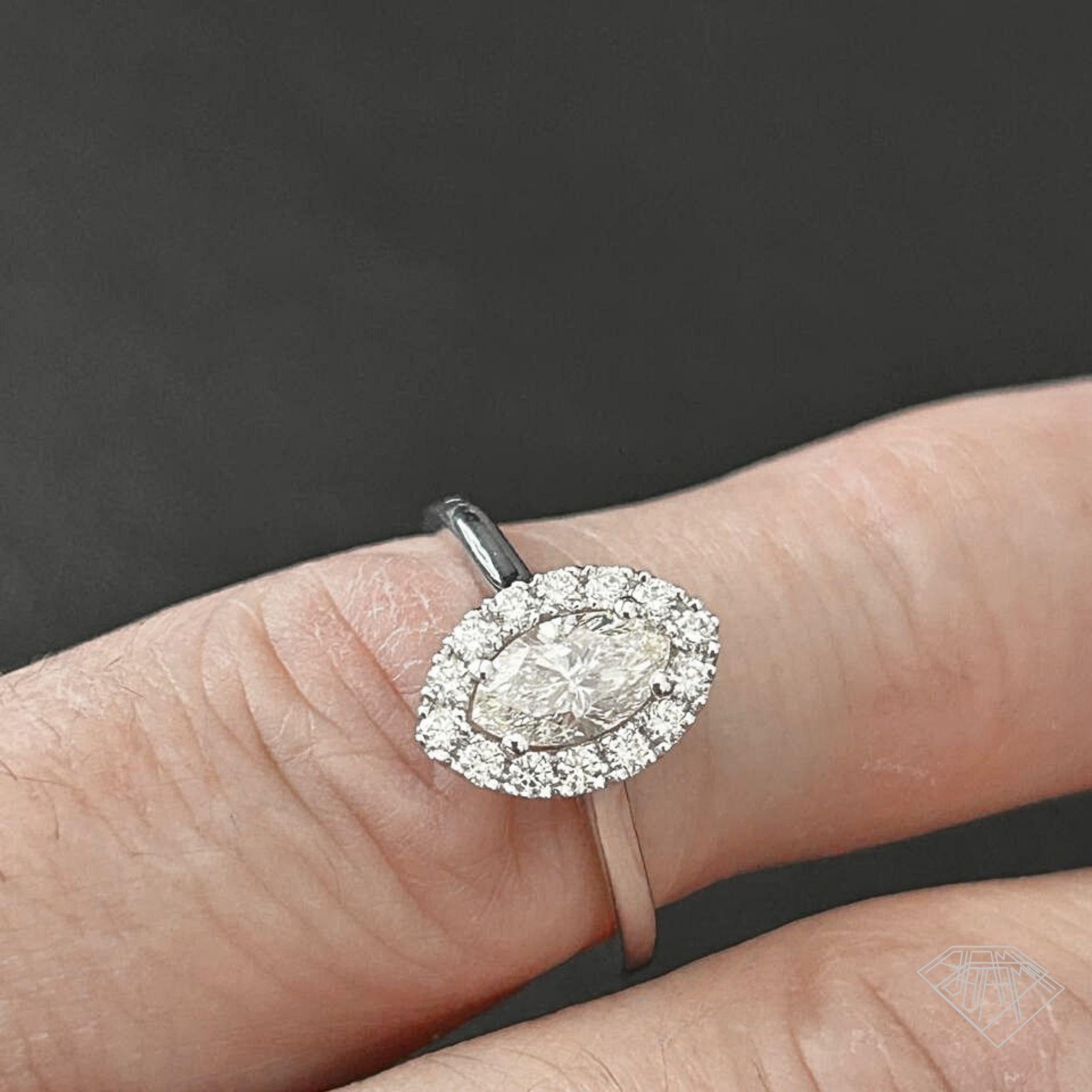 Eleganter Halo-Diamantring mit Marquise-Schliff im Angebot 8