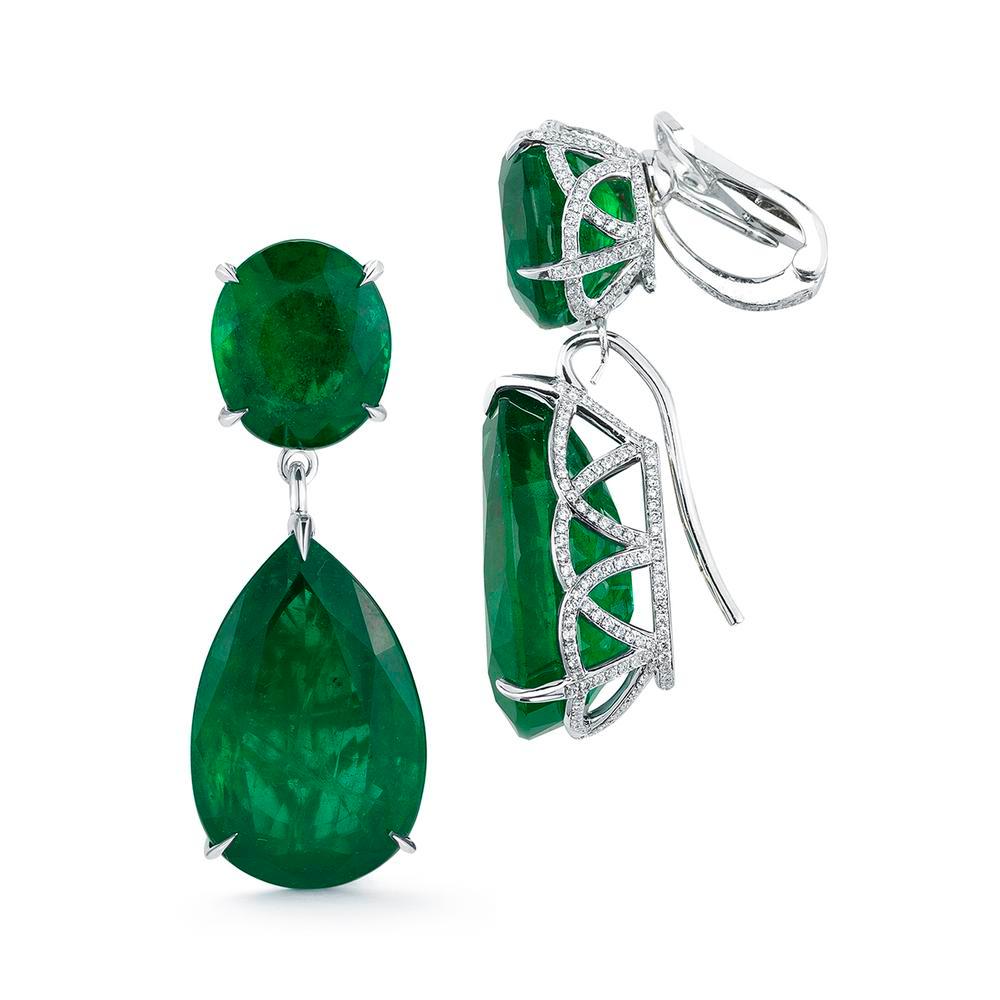 THE EMERALD HOLLYWOOD EARRINGS
A classic style that has graced many a red carpet, this versatile Emerald earring can actually be worn three different ways.
 
Item:	# 02108
Setting:	18K W
Lab:	        GIA & C.Dunaigre
Color Weight:	56.85 ct. of