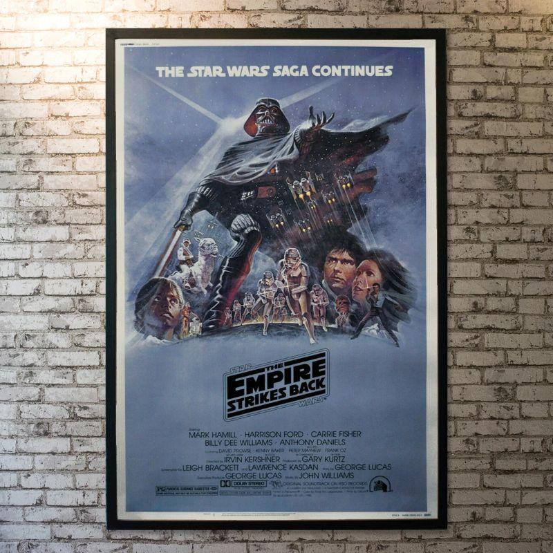 The Empire Strikes Back, Unframed Poster, 1980

Original US (40 X 60 Inches). After the Rebels are brutally overpowered by the Empire on the ice planet Hoth, Luke Skywalker begins Jedi training with Yoda, while his friends are pursued across the