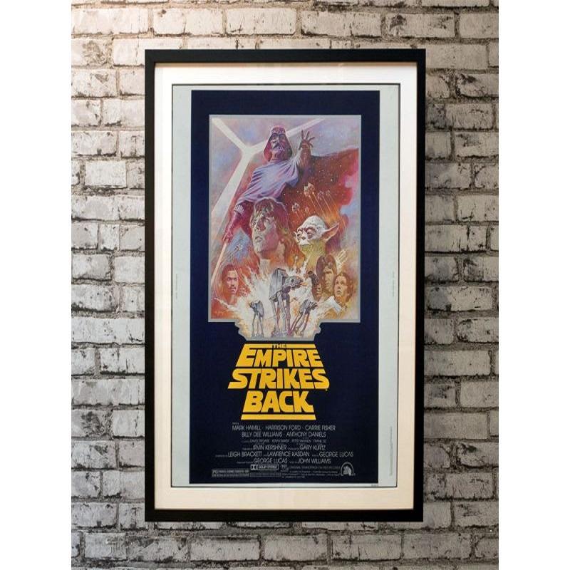 The Empire Strikes Back, Unframed Poster, 1981

Original 30 x 40 (30 X 40 Inches). Darth Vader is adamant about turning Luke Skywalker to the dark side. Master Yoda trains Luke to become a Jedi Knight while his friends try to fend off the Imperial