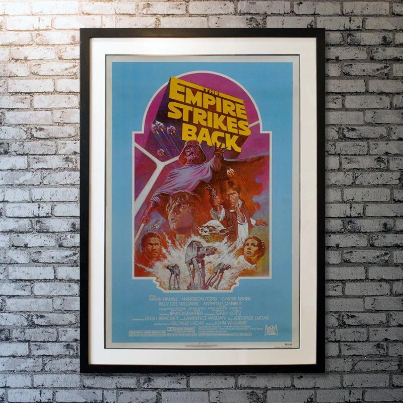 The Empire Strikes Back, Unframed Poster (1982)

Original One Sheet (27 X 41 Inches). After the Rebels are brutally overpowered by the Empire on the ice planet Hoth, Luke Skywalker begins Jedi training with Yoda, while his friends are pursued