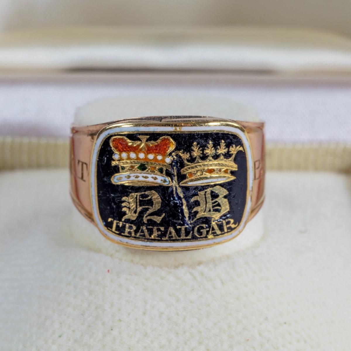 The enamel and gold Nelson memorial ring made for his aunt, Mrs Thomasine Goulty (1733-1821), commemorating the death of Admiral Viscount Nelson at the Battle of Trafalgar, the shank is engraved with Nelson’s heraldic motto: ‘Palman Qui Meruit