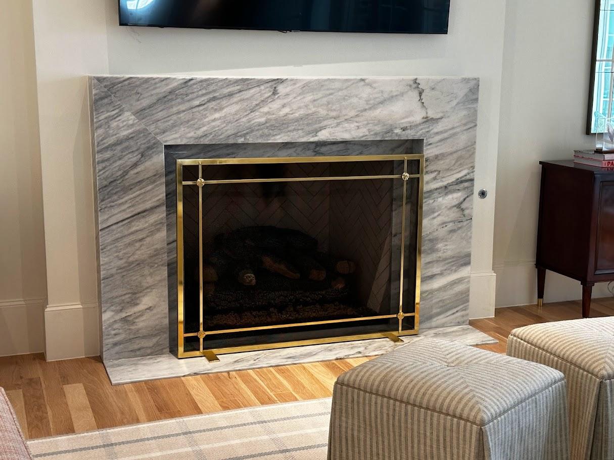 The Enola screen is a classic brass design with our handmade brass rosettes. It is shown here with an unlacquered brass finish and is also available in a nickel plated finish for a 400.00 upcharge. Available in any custom size and will ship in 4