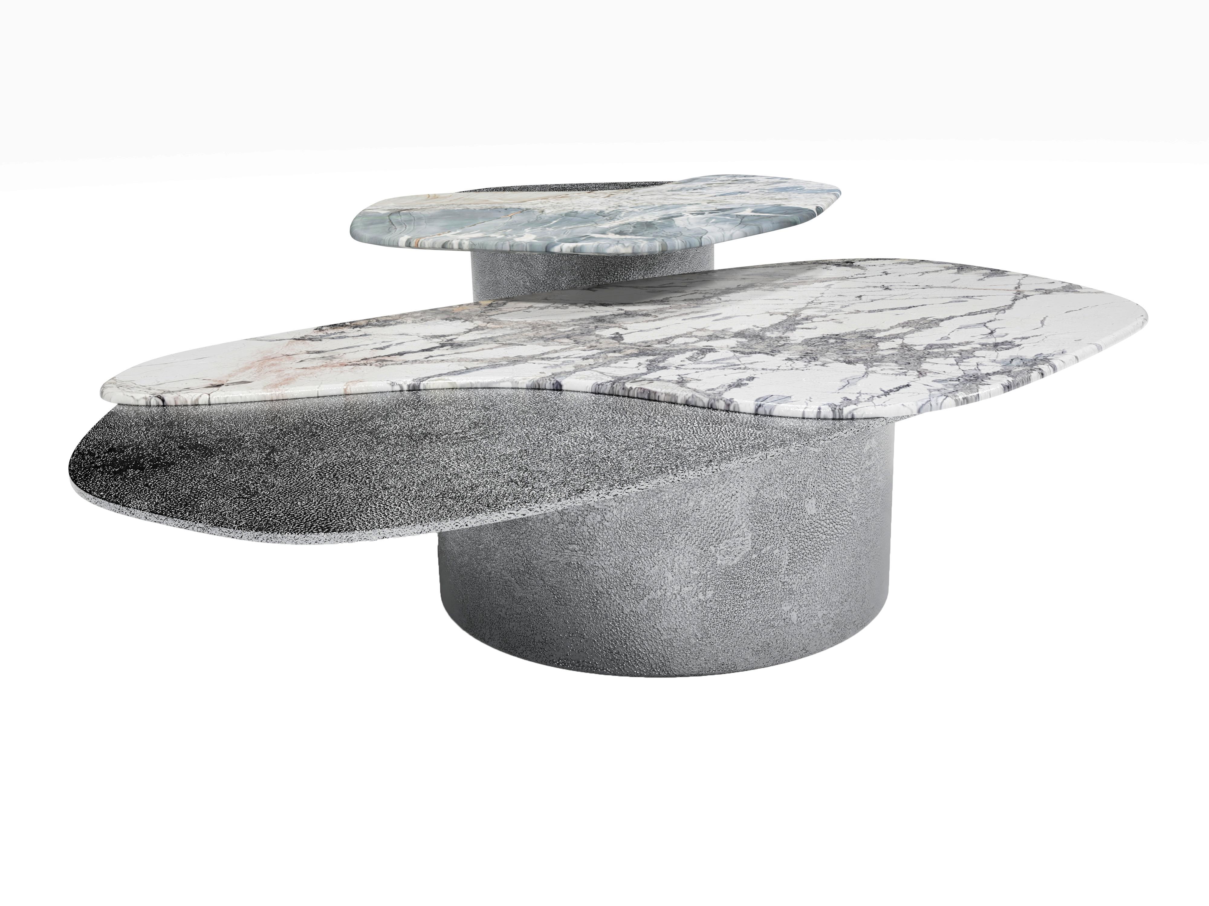 The Epicure IV coffee table set, 1 of 1 by Grzegorz Majka
Edition 1 of 1
Dimensions: 63 x 63 x 13 in
Materials: Aluminium, quartz and brass

“No man is an island entire of itself; every man is a piece of the continent, a part of the main.” The