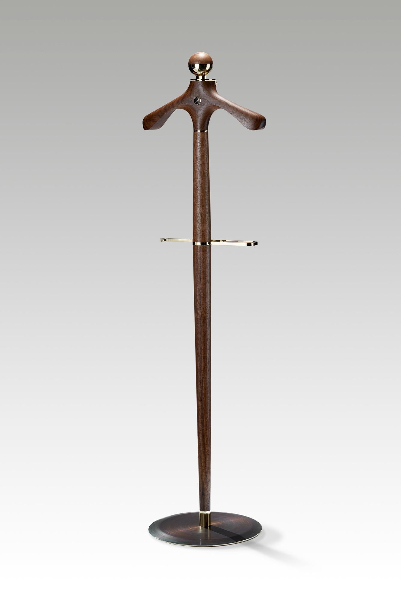 The Essential valet stand preserves all the finest features of our series of products and provides new uses while saving space at home or in the office.

On this piece, which has become our calling card, you find a coat hanger sculpted from a