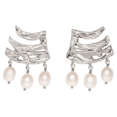 Les boucles d'oreilles Eternal Luck avec perles d'eau douce