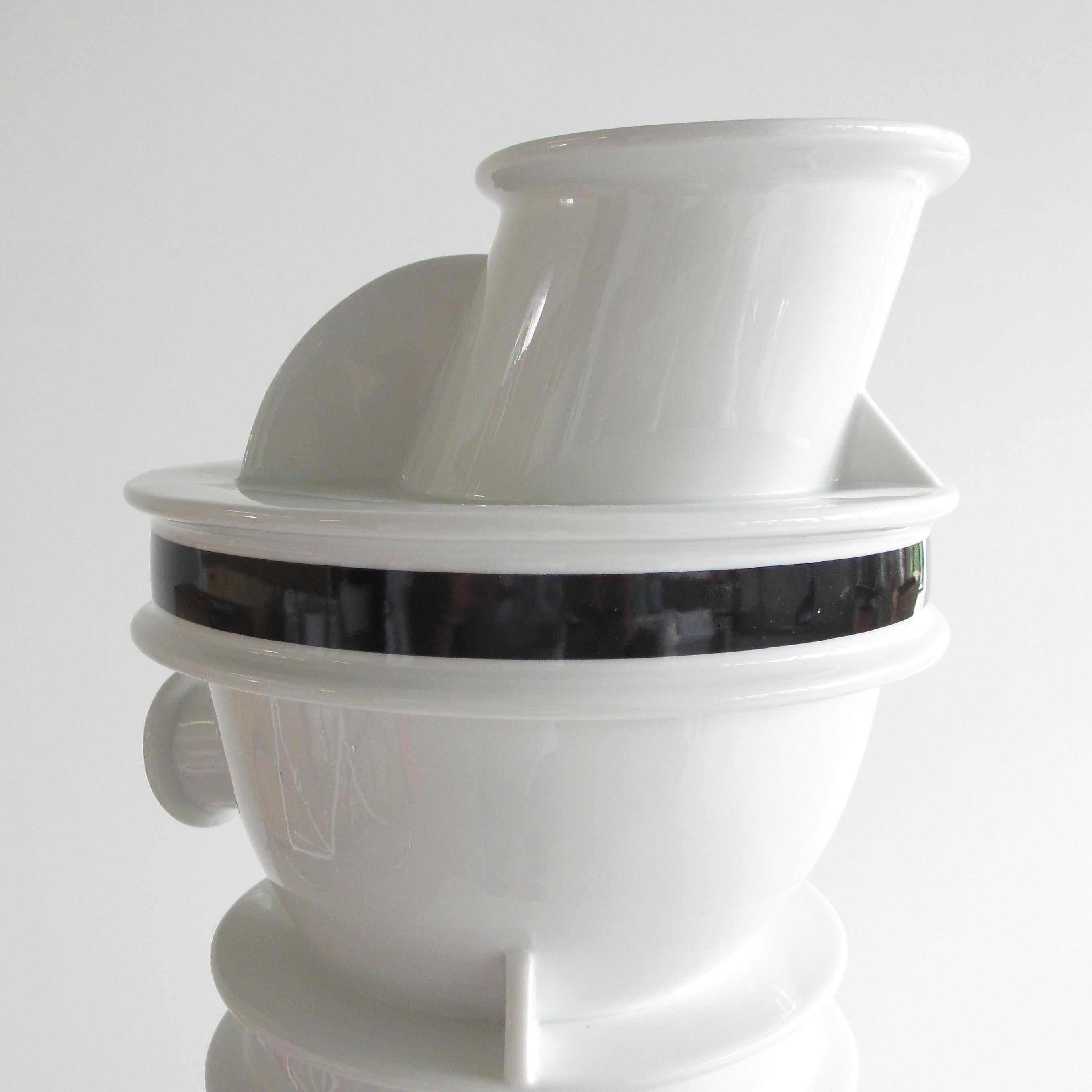 Vase in ceramic, by Ettore Sottsass, 1983.

The Euphrates vase, made of ceramic porcelain. This is part of the Rivers series, designed by Sottsass 1981-1988.

Stamped underneath.

Ettore Sottsass (14 September 1917 – 31 December 2007). Italian