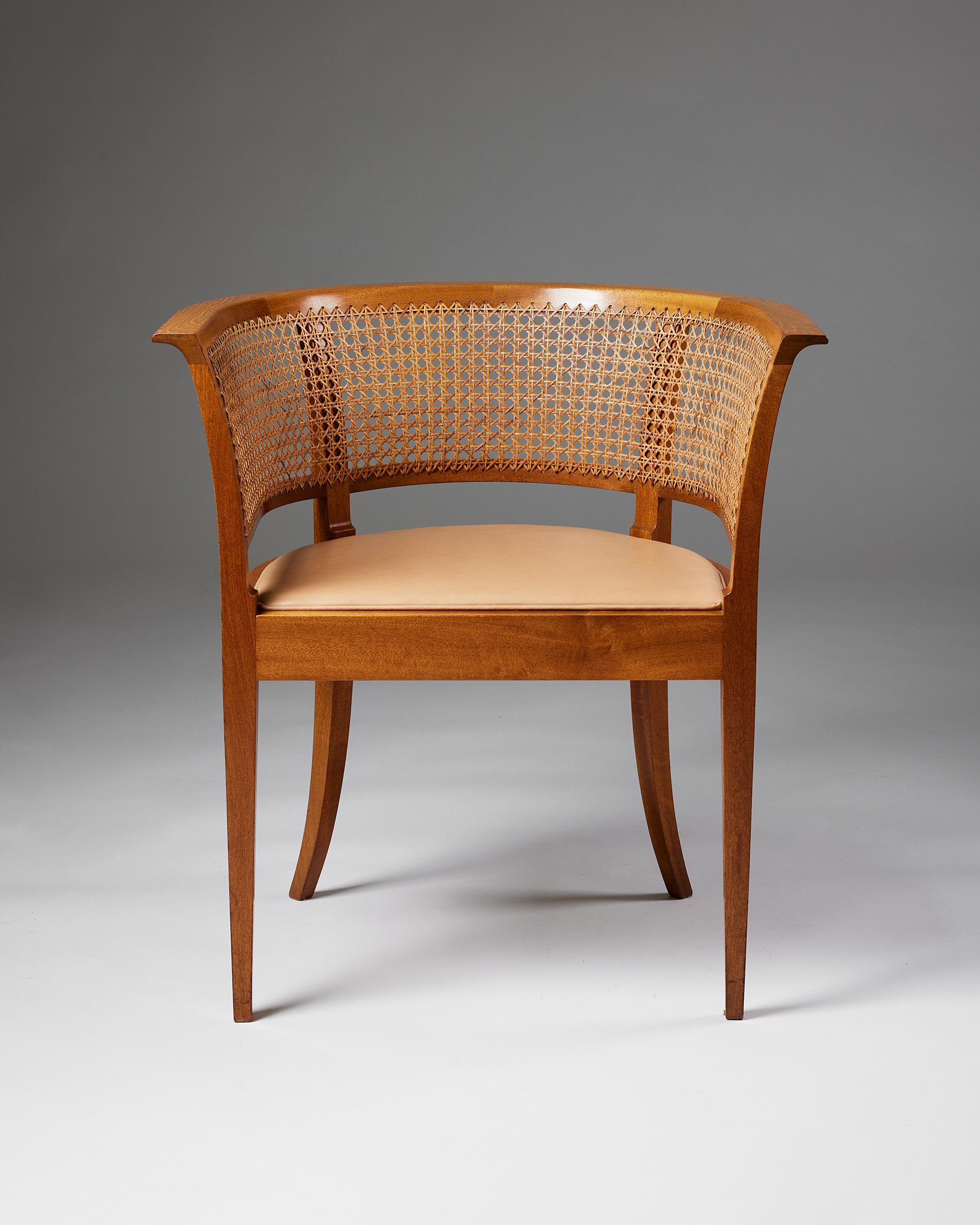 ‘The Faaborg Chair’ designed by Kaare Klint for Rud. Rasmussen Cabinetmakers,
Denmark, 1914.
Mahogany, woven cane and leather.

Labelled with the manufacturer's label.

Designed in 1914 for the Faaborg Museum. This example was made in the