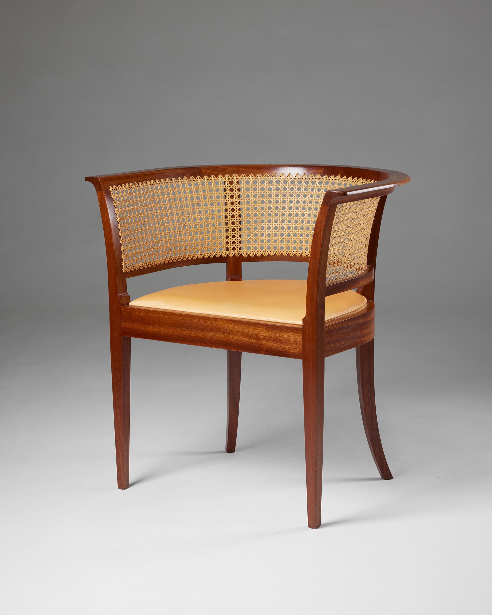 The Faaborg Chair’ designed by Kaare Klint for Rud. Rasmussen Cabinetmakers
Denmark, 1914.

Mahogany, woven cane, and leather.

Designed in 1914 for the Faaborg Museum. This example was made in the 1960s.

H: 73 cm
W: 69 cm
D: 54 cm
Seat H: 45