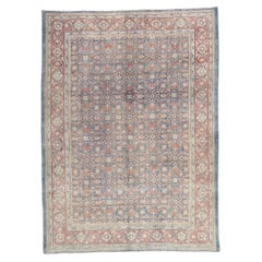 The Faded Azure Court: An Antique Persian Tabriz of Timeless Elegance