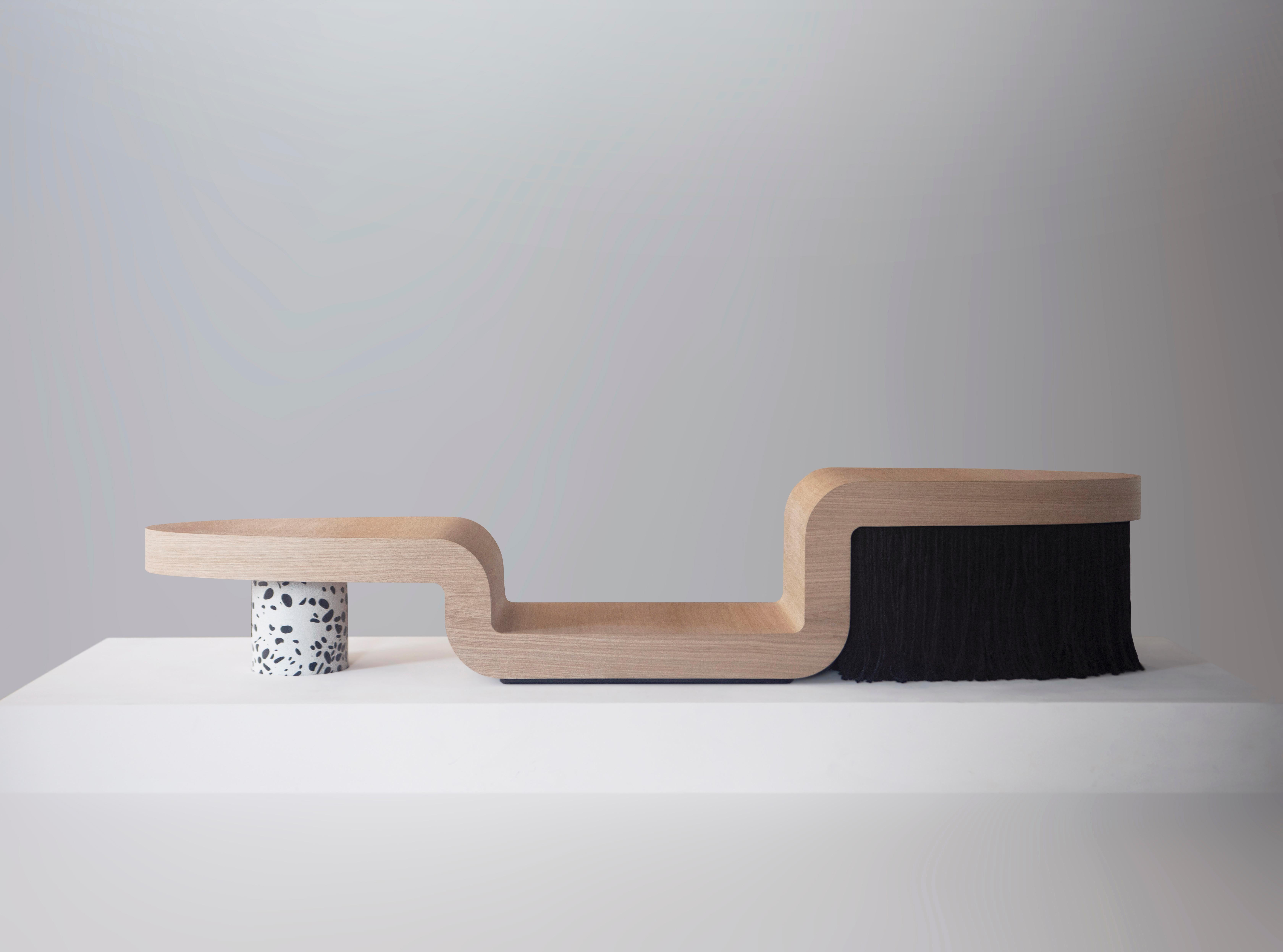 Product designer Mat Driscoll and interior design firm Ishka Designs collaborated for the first time on this piece for TIMBER! The Family bench is a sculptural form embracing furniture as art and is made of hand-finished oak, terrazzo, cotton,