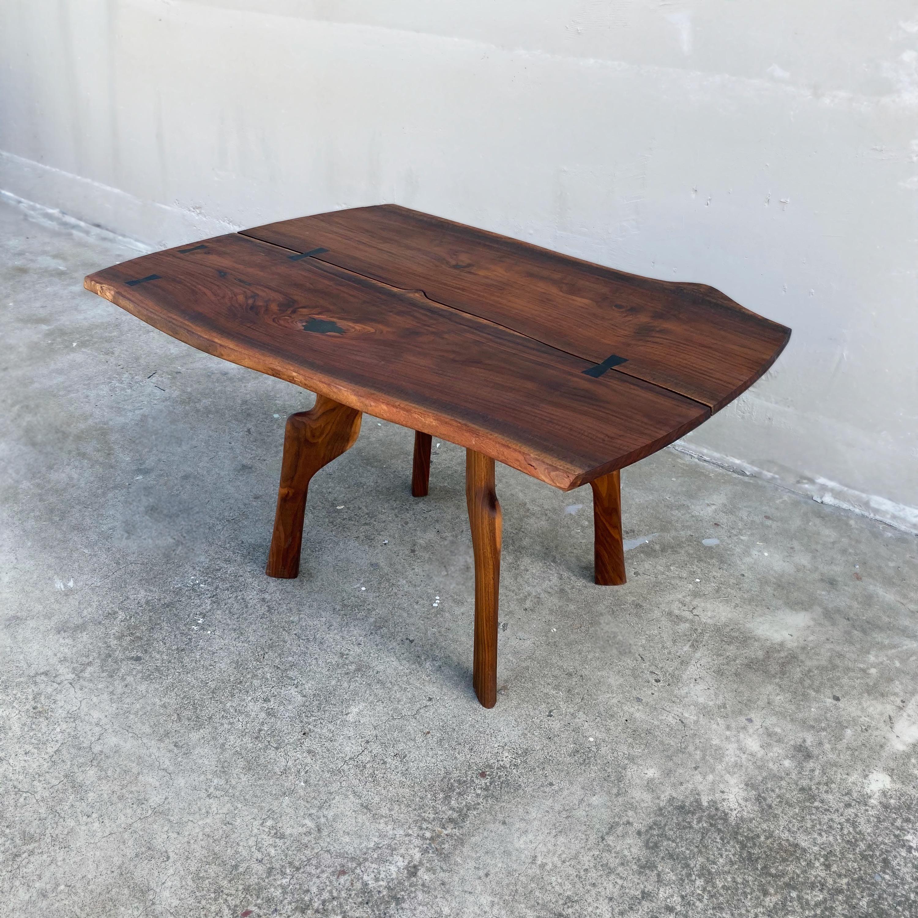 This walnut table was designed prior to the birth of our lead artist and CEO Sung Kim’s son.
