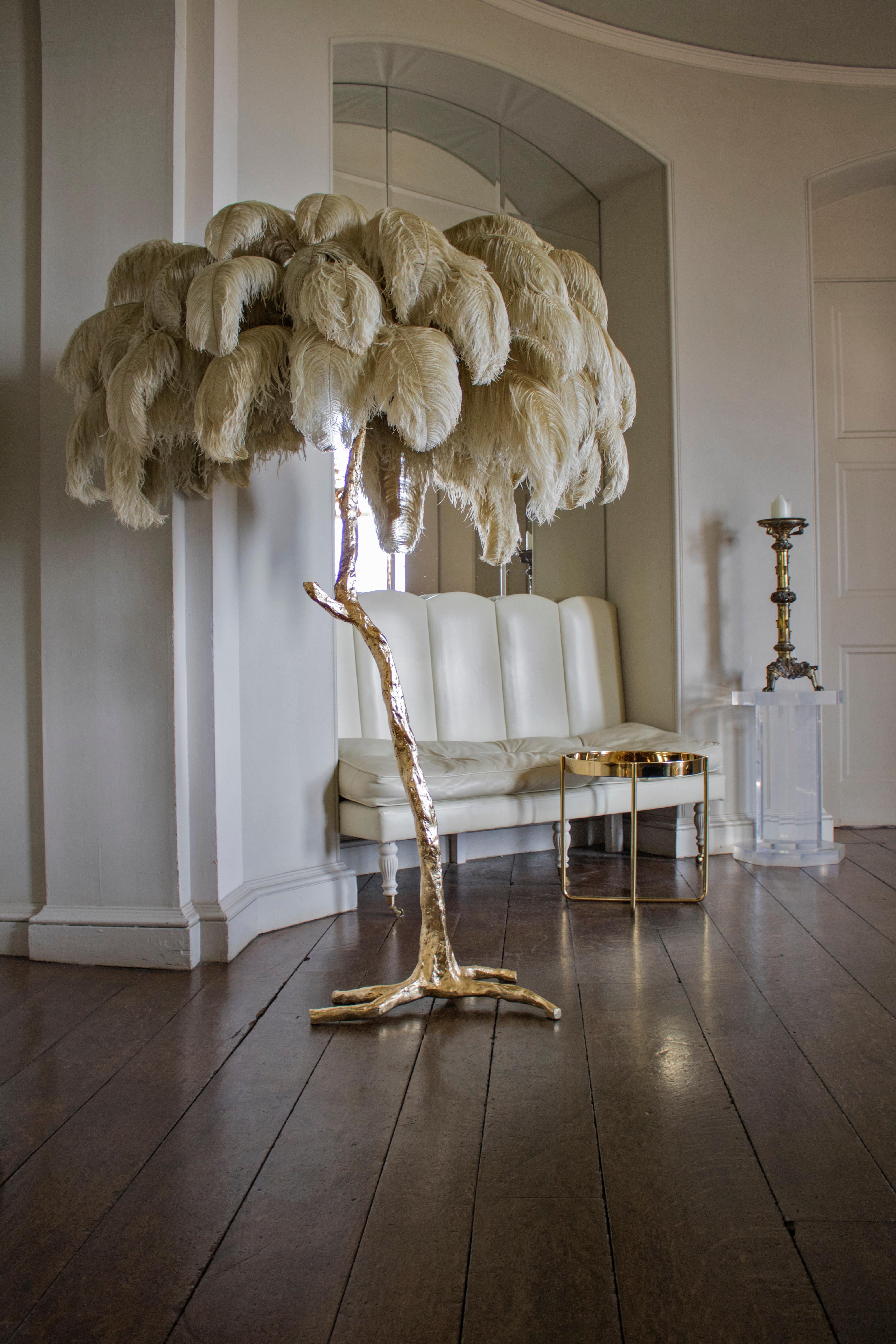 The feather floor lamp, edition piece by A Modern Grand Tour.

An illuminating palm tree, resplendent with exquisite ostrich feather foliage, the feather floor lamp takes centre stage in any luxury setting and delivers the ultimate midas touch to