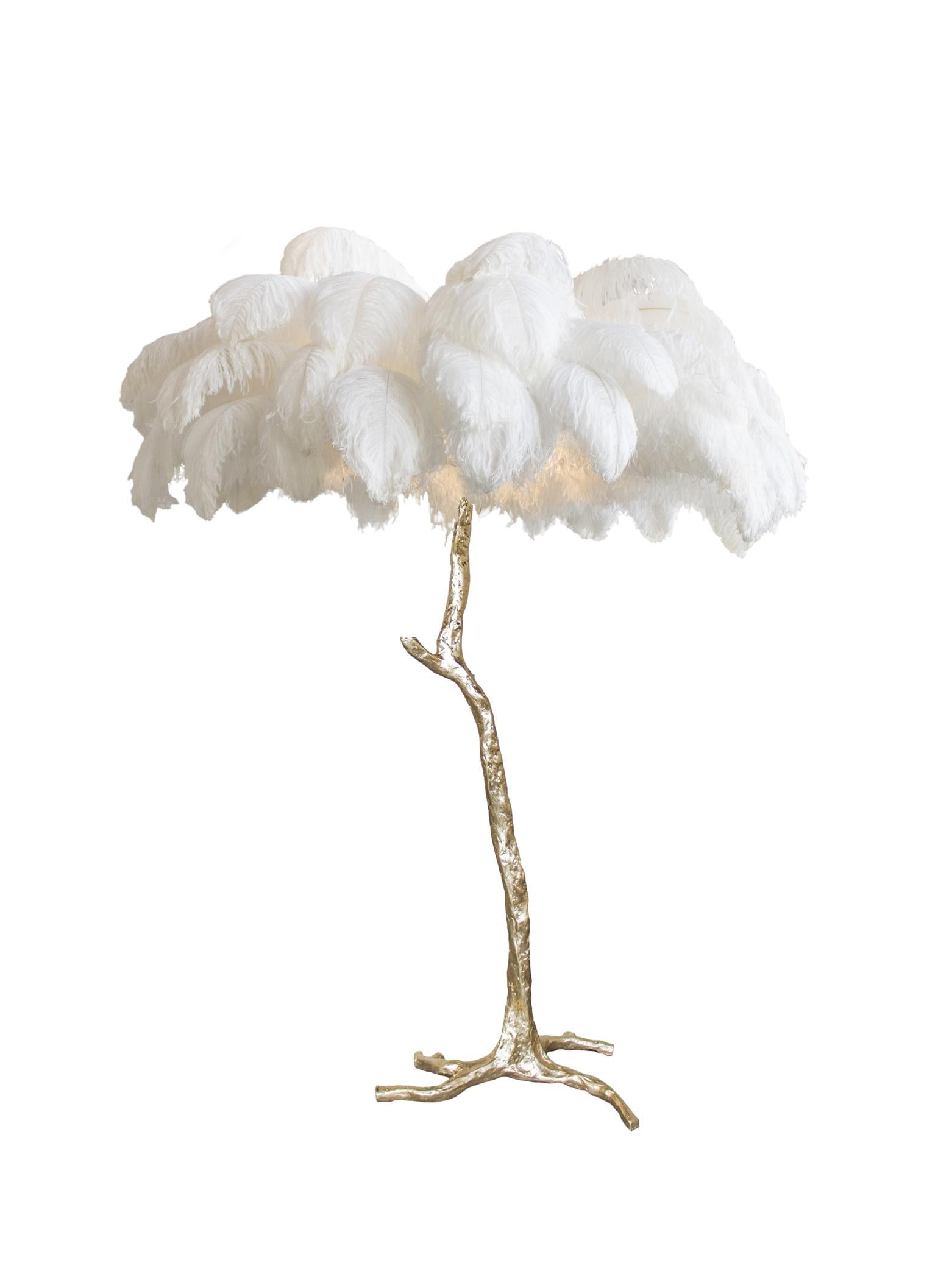The ostrich feather lamp, edition piece by a modern Grand Tour.

An illuminating palm tree, resplendent with exquisite ostrich feather foliage, the feather lamp takes centre stage in any luxury setting and delivers the ultimate midas touch to