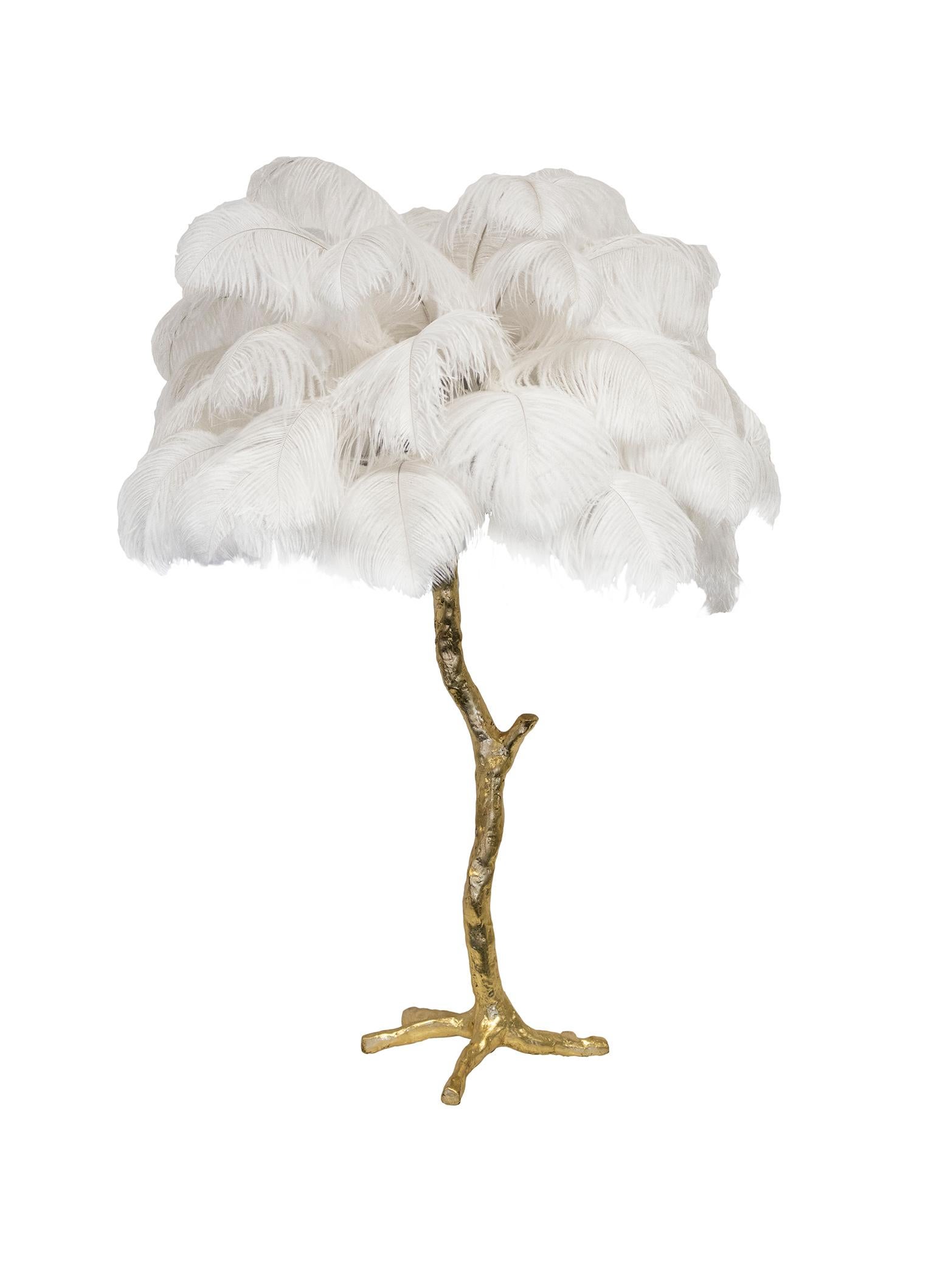Our feather table lamp is a bijoux version of the exquisite, illuminating Ostrich floor lamp. Each piece delivers a glorious luxurious statement to any design or styling project - perfect in pairs!. 

Ideal for a decadent bedroom or old Hollywood