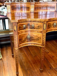 THE Finest late 18th C. inlaid flame mahogany Hepplewhite Serpentine Sideboard