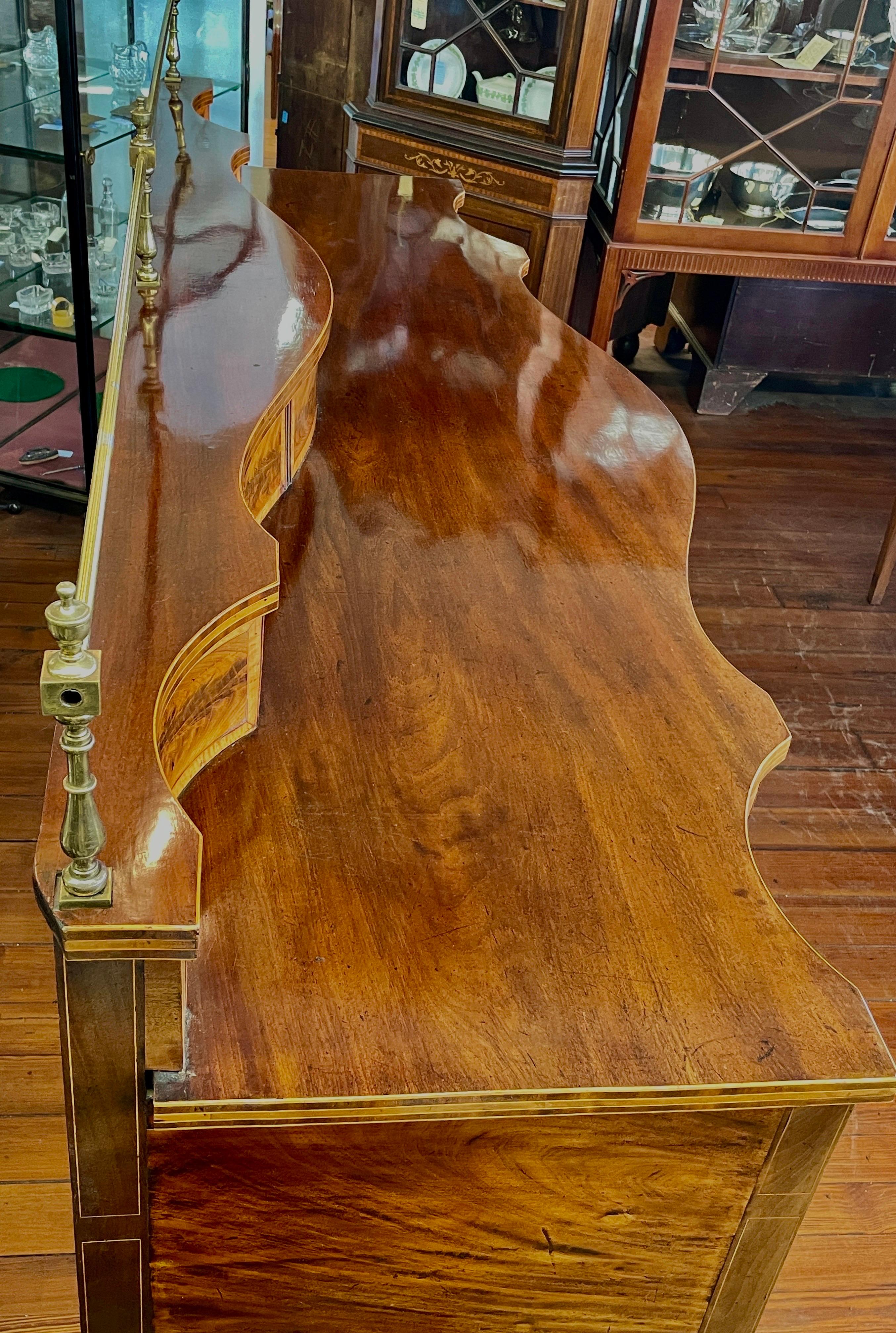 18th Century THE Finest late 18th C. inlaid flame mahogany Hepplewhite Serpentine Sideboard
