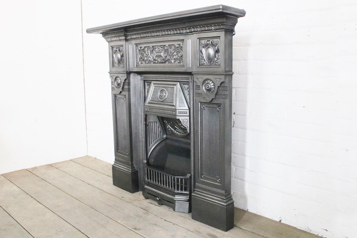 The fire queen, a large late Victorian cast iron combination grate decorated with finely cast panels.

Dated 1886. 

Finished with traditional black grate polish and suitable for either a solid fuel fire or a living flame gas fire.