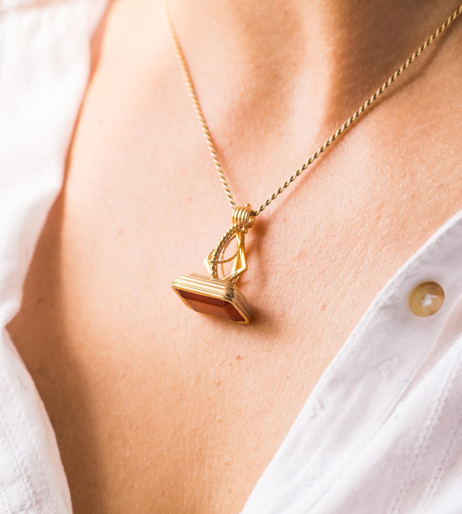 Handmade in 18ct gold, the Fleur Fairfax Gemstone Fob takes it’s design inspiration from an original decorative fob seal circa 1835.

In the Georgian age, fobs were ubiquitous ornamental male accessories; decorative letter seals that adorned a