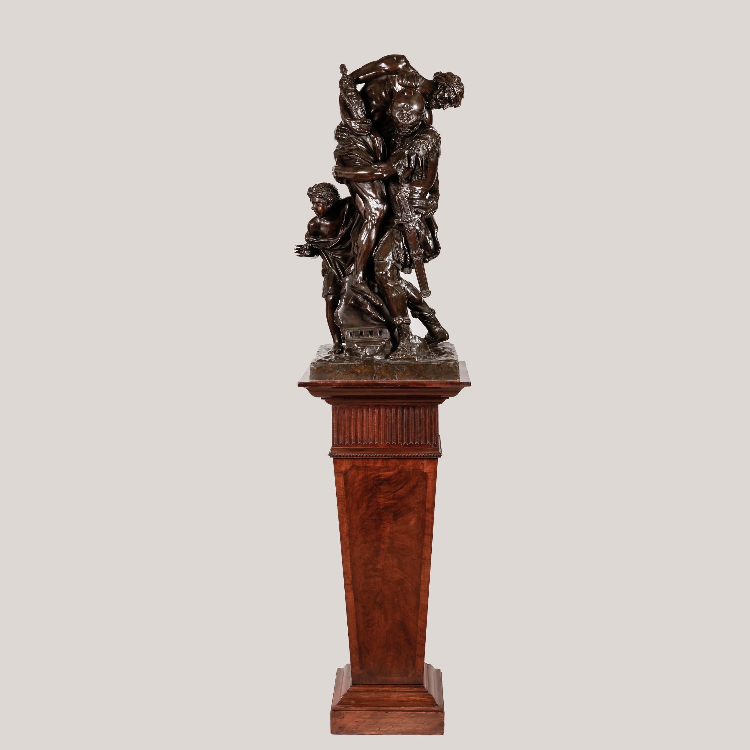 The Flight from Troy
Aeneas Carrying his Father Anchises
After Laurent Guiard (1723-1788)

An impressive bronze with fine patinated surface, depicting the hero Aeneas carrying his aged father over his shoulder and accompanied by his young son