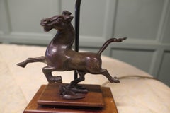 The Flying Horse of Gansu Set as a Lamp   This is a bronze statue