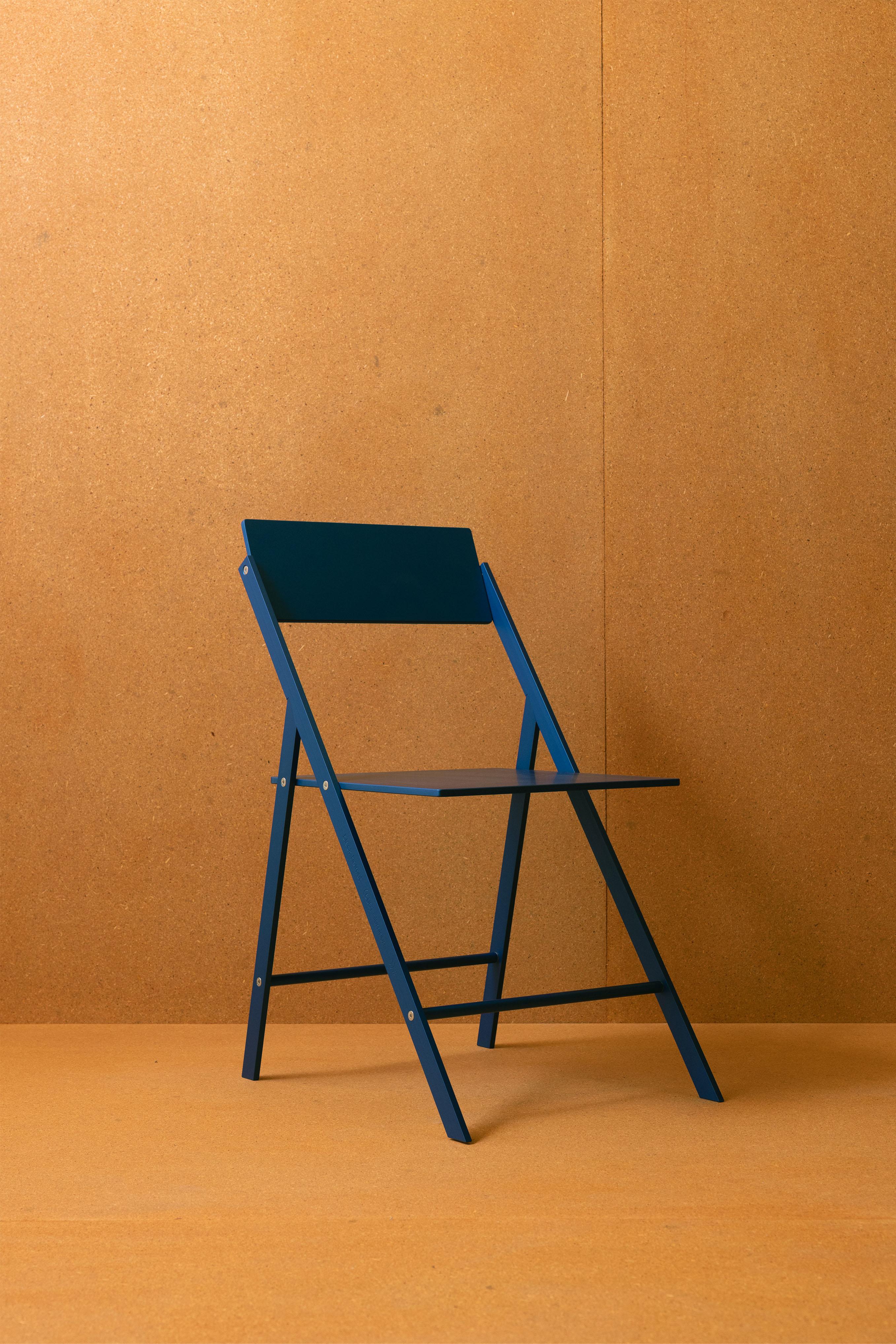 The Folding Chair by black helmut; the utility of a folding chair reimagined in luxury materiality and post-modern form. 

blue anodized “international klein blue” finish

solid 6061 aluminum structure, aluminum seat, swiveling back rest,