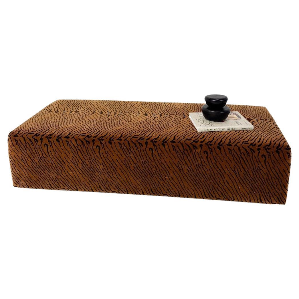 What is the difference between an ottoman and a pouf?