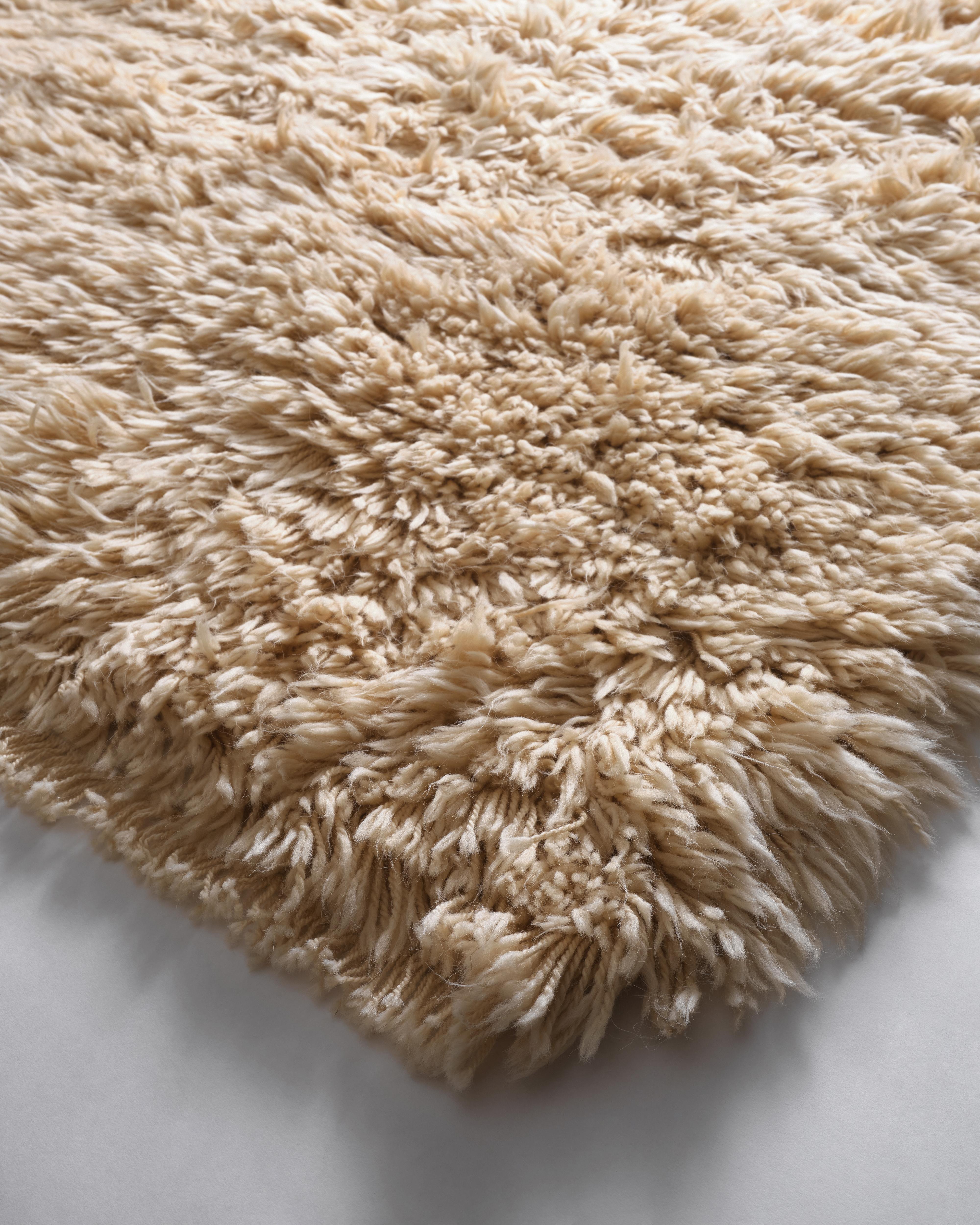 Introducing The Shag Rug collection. Anne and Maggie grew up with a 1970s Flokati rug their Mom shlepped home from Greece during her world travels. They've been wanting to recreate that style since day one - a thick, high pile, 70s, run your fingers