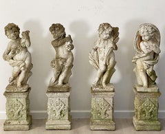 The Four Seasons Cherub Statues on Pedestals, Garden Stone Statuary