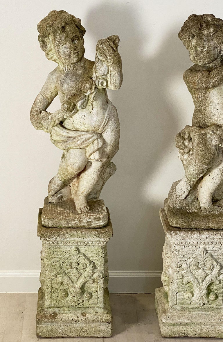The Four Seasons Cherub Statues on Pedestals, Garden Stone Statuary at