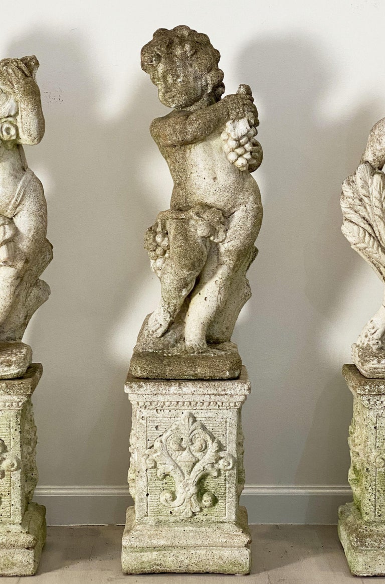 The Four Seasons Cherub Statues on Pedestals, Garden Stone Statuary at