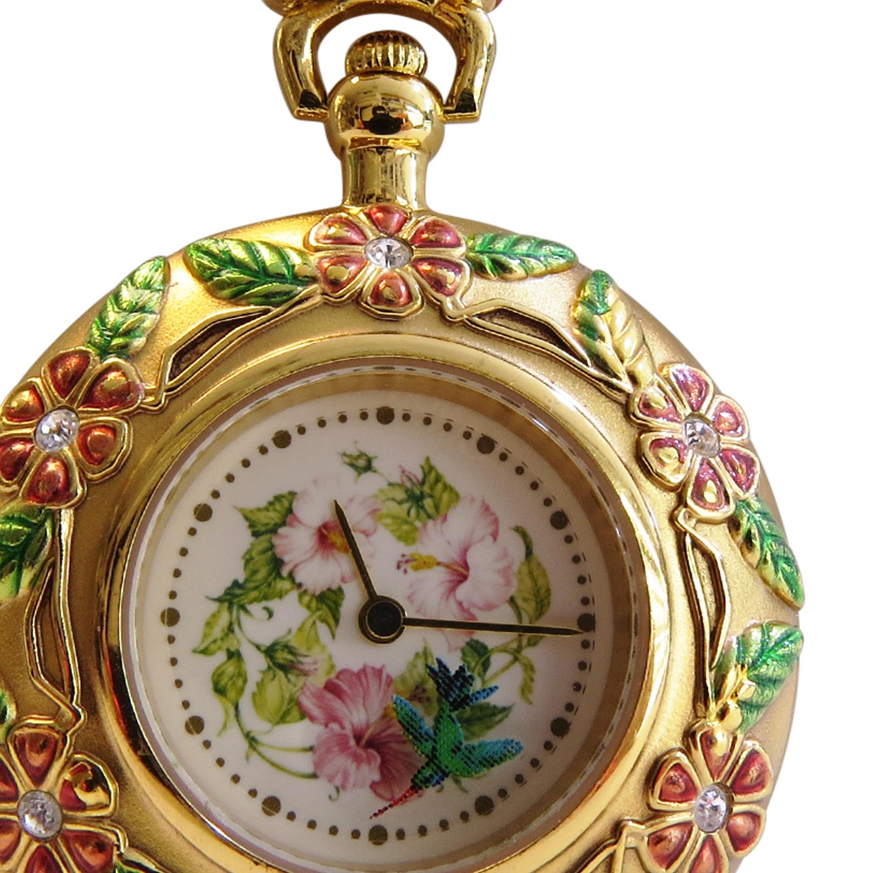 The Franklin Mint 
Diameter= 37mm
Flower design Painted 
Quartz movement 
18k Gold Electro plated