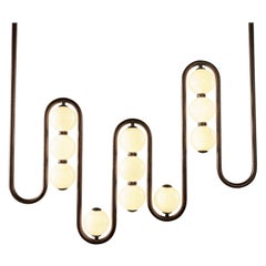 La lampada a frequenza con LED integrato e ottone