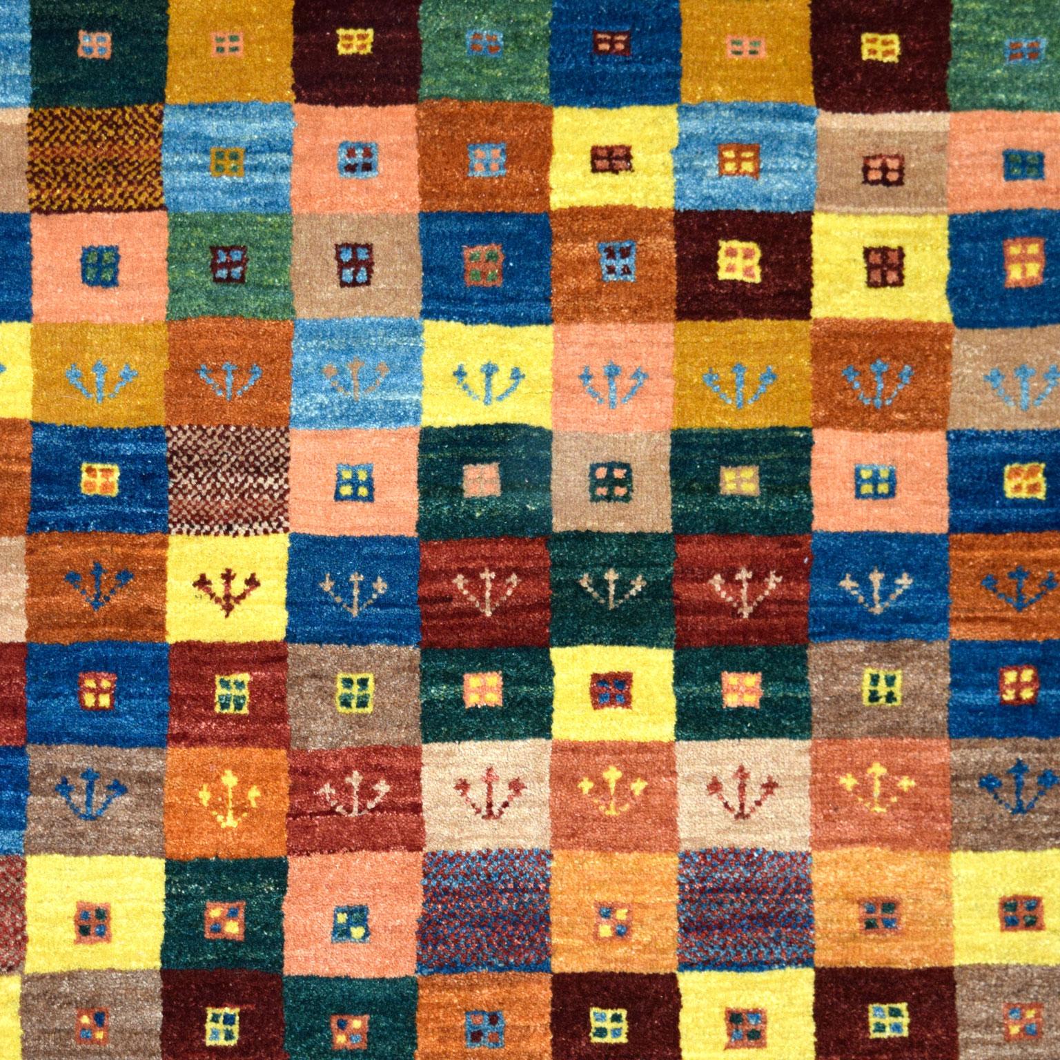 This Persian Luri Gabbeh tribal rug measures 2'8
