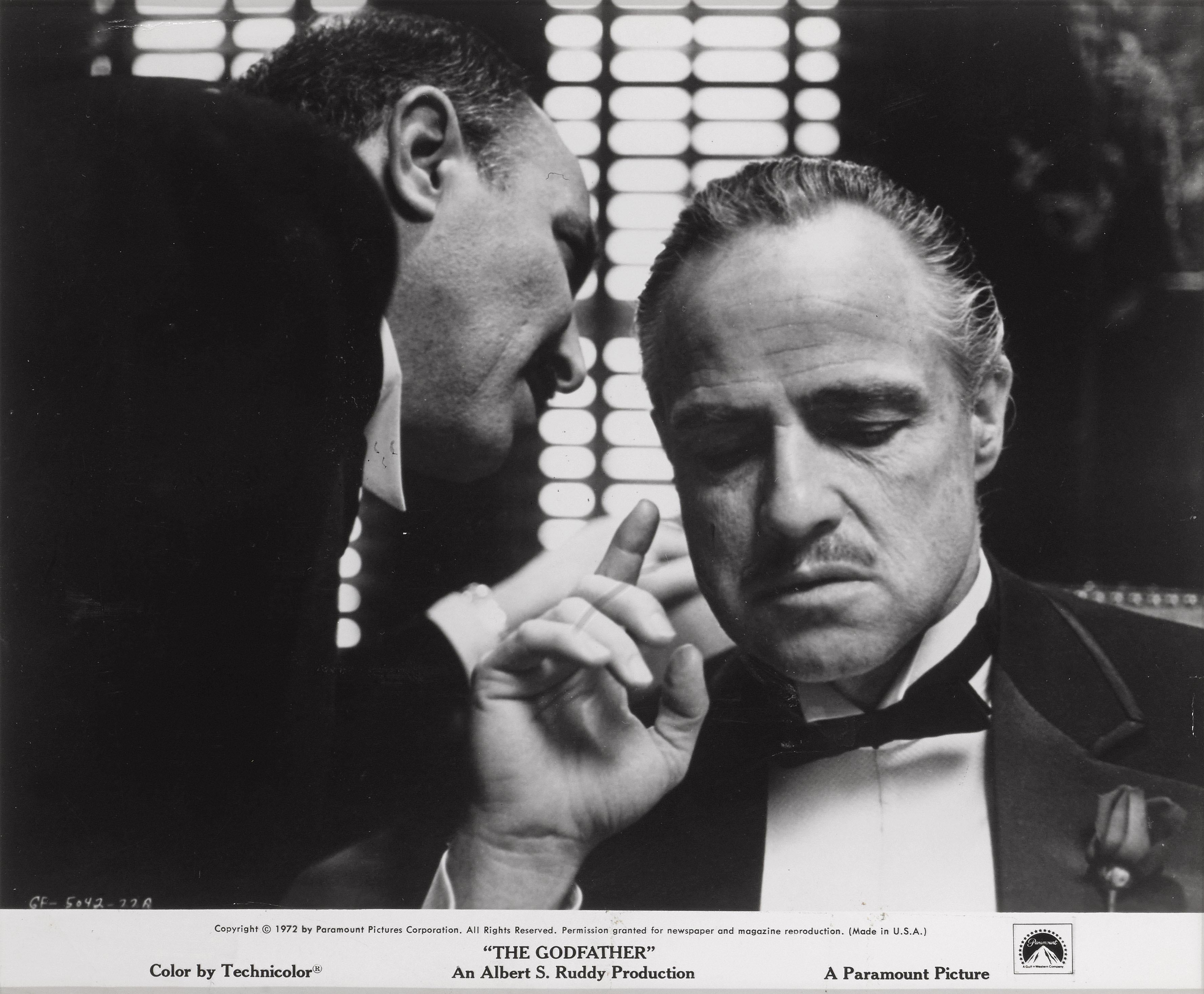 Original US photographic production still for Francis Ford Coppola's gangster masterpiece starring Marlon Brando, Al Pacino and Robert Duvall. This piece is Framed in a Sapele wood frame with acid free card mounts and UV plexiglass. The size given