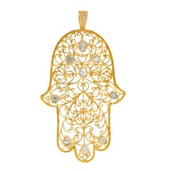 The Gold Hamsa Pendant with Diamonds