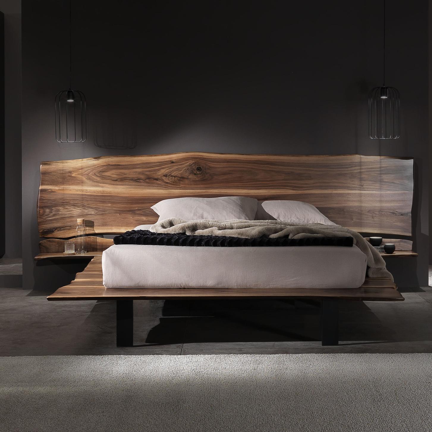 The Golden Age Double Bed by Francesco Profili
Dimensions: W 310 x D 230 x H 60 cm (Aproximate height)
Materials: Walnut, Lacquered Iron, Brass, Bronze.

The bed is composed by the harmonious combination of the slabs of wood, which create a natural