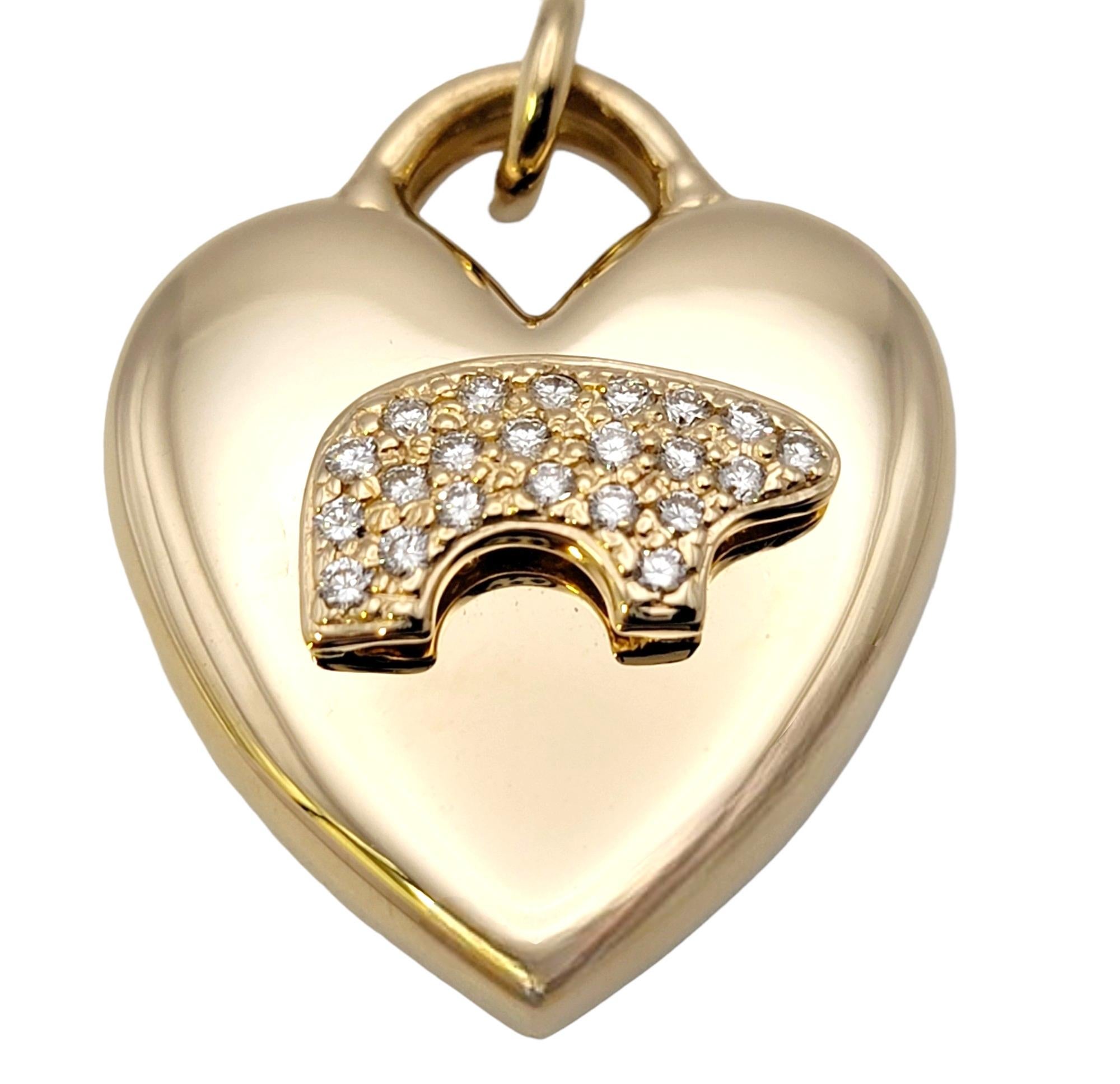 This charming heart pendant was designed by The Golden Bear. Founded in Vail, Colorado, in 1975, the Golden Bear store's distinctive little bruin would become recognized as 
