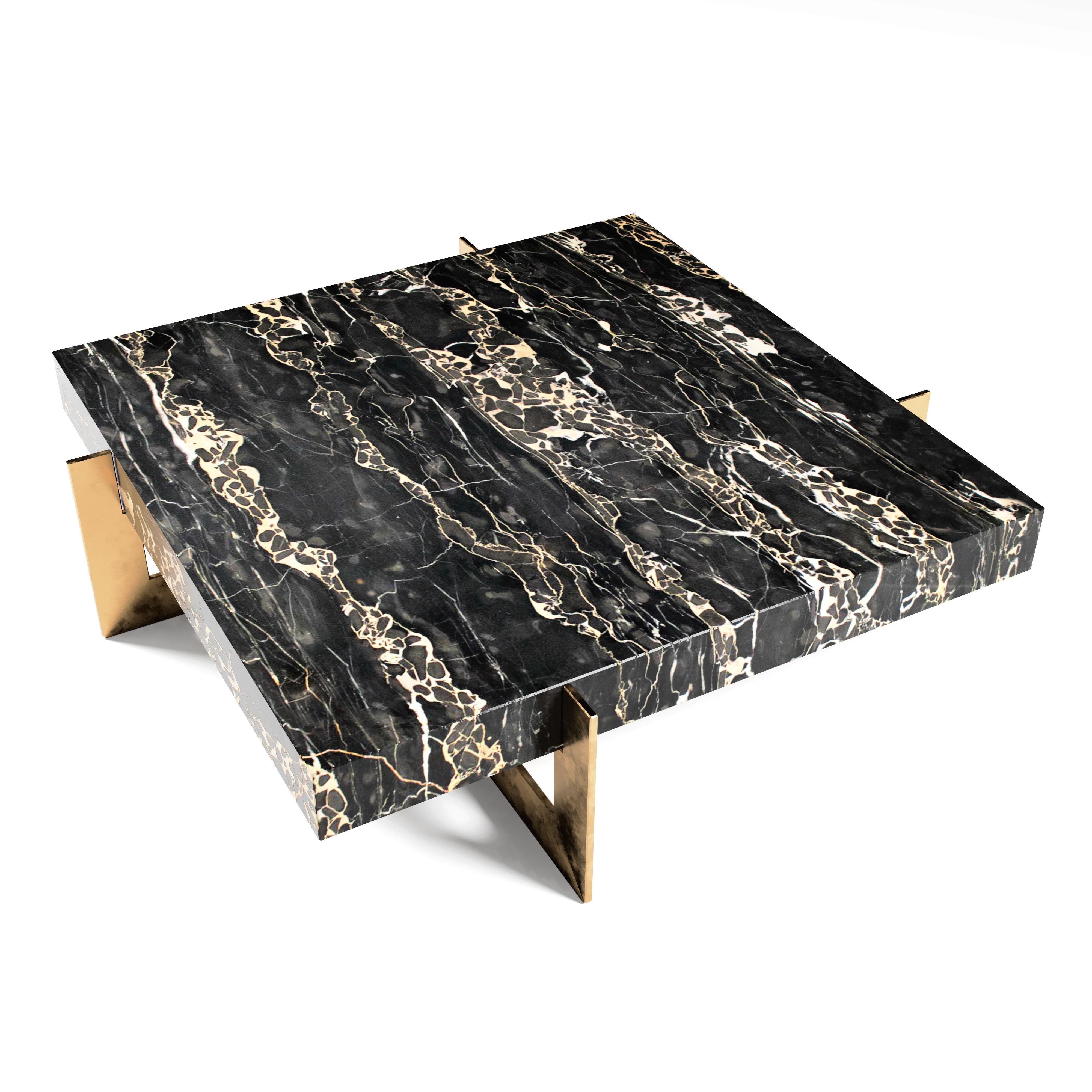 “The Golden Rock II” Center Coffee Table ft. Nero Portoro Marble and Burnished Brass Base in “Satin” finish.

When one hears the term “Golden Rock”, it’s hard not to envisage scenes of regal beauty. A mansion of gold glittering in the sunset, or a