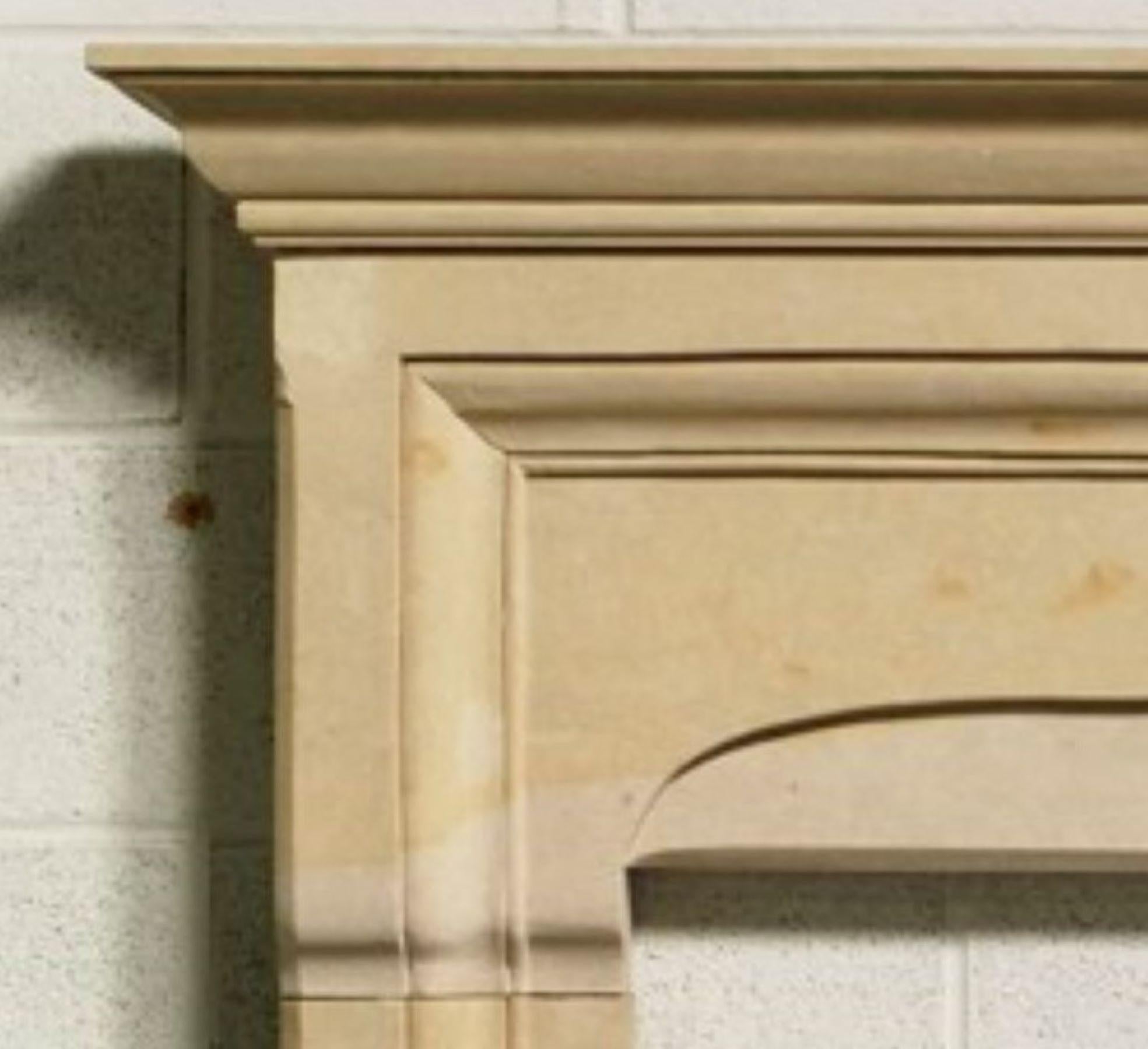 Carved The Gothic: A Classic Tudor-Style Stone Fireplace with a Modern Twist For Sale