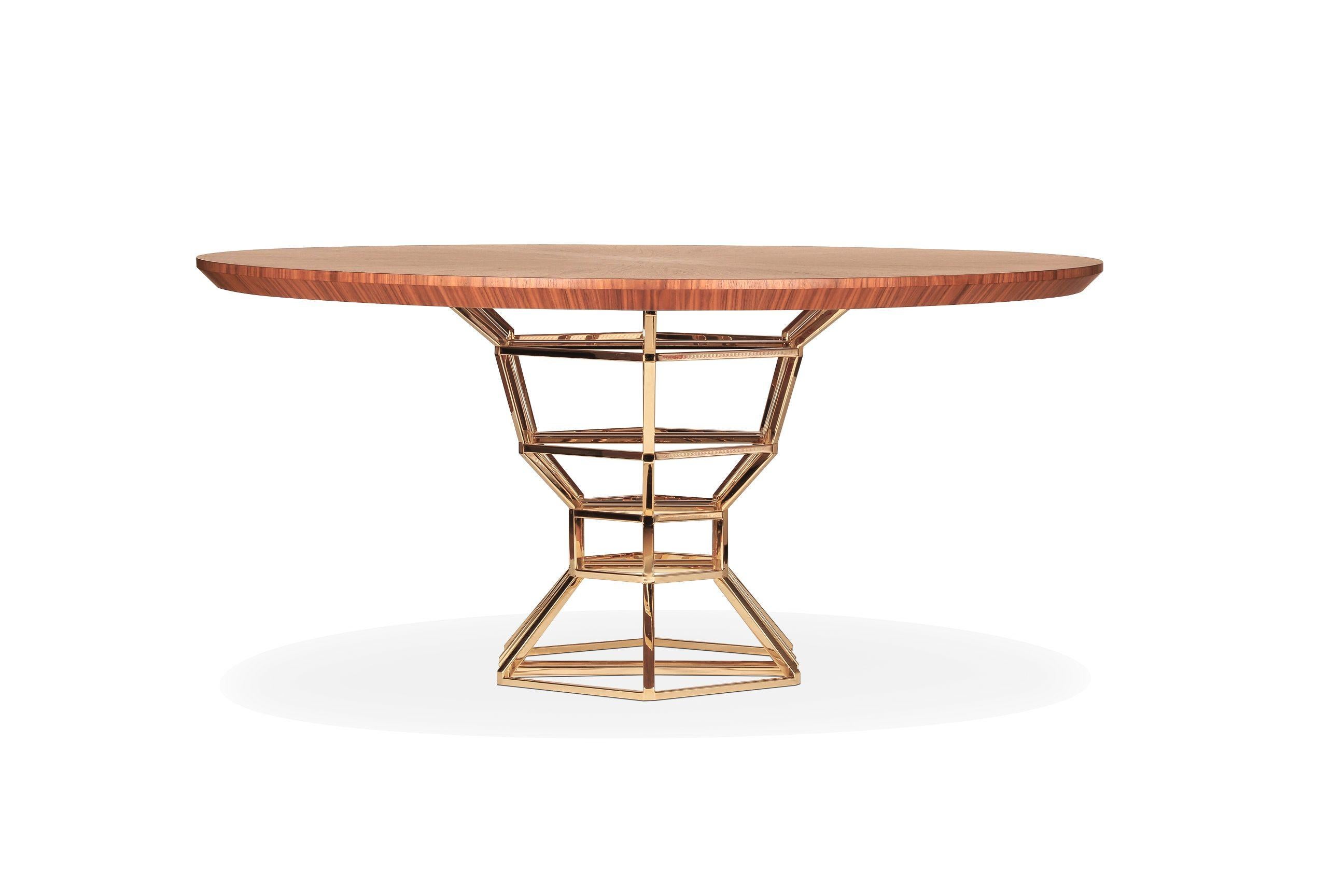 The Graal table by Royal Stranger
Dimensions: 160 x 160 x 75 cm
Materials: Walnut wood veneer inlay marquetry with matte finish and polished brass legs.

Based on a giant structural noble metal bowl, the base of the table worked in walnut wood