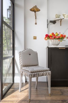 The Gracie Chair, traditionally hand upholstered in Ticking Stripe