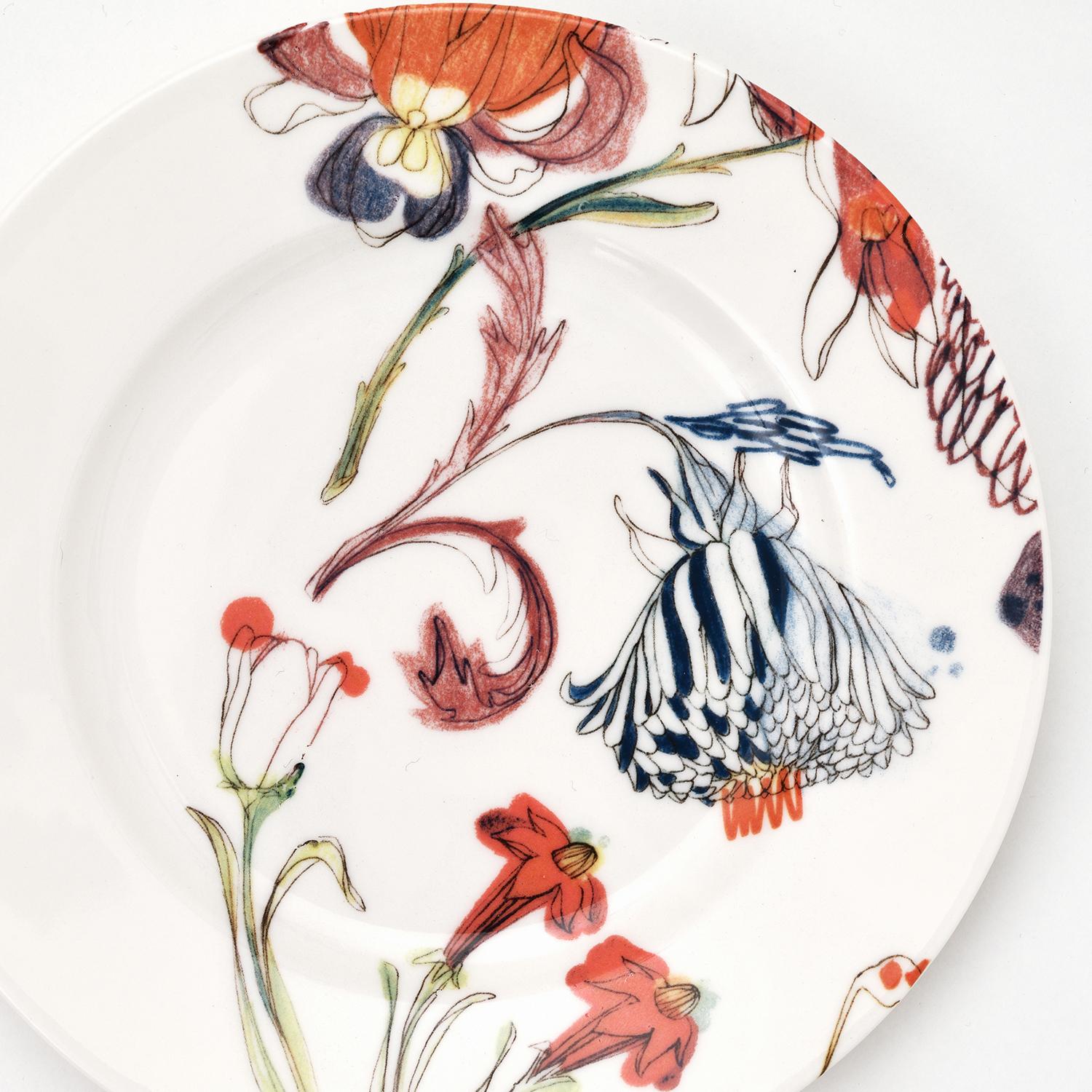 Belonging to the Grandma's Garden porcelain series, the design of this bread plate represents a sophisticated and elegant floral designs full of blossoms and buds with delicate colors blending together for a fresh and contemporary look, typical of
