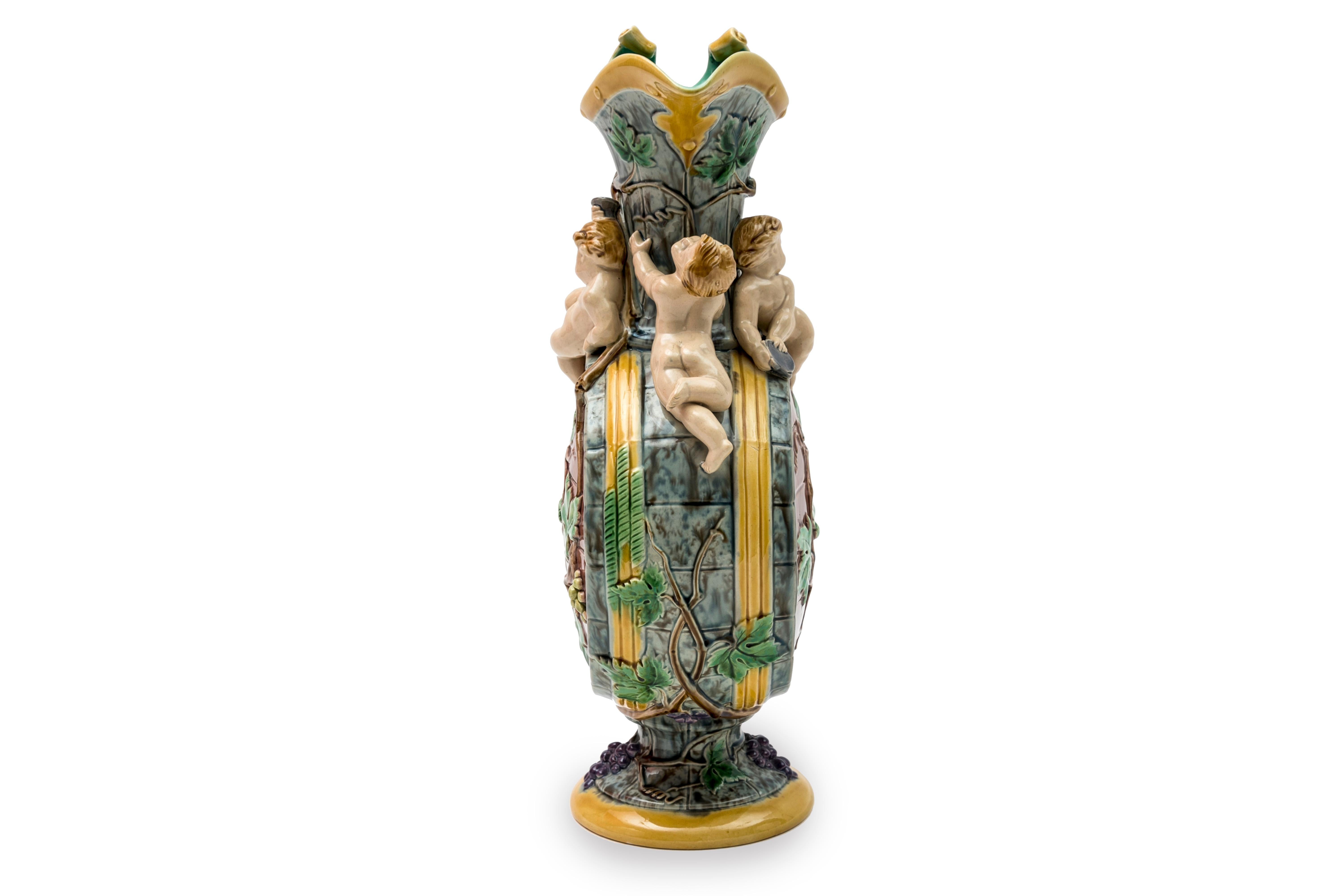 The Grape harvest ewer
Hugues Protat
Minton manufacture, Stoke-on-Trent, Great-Britain
Majolica
1872

The ewer of the grape harvest presents a decoration in the Renaissance revival style of the times, evoking its function through the